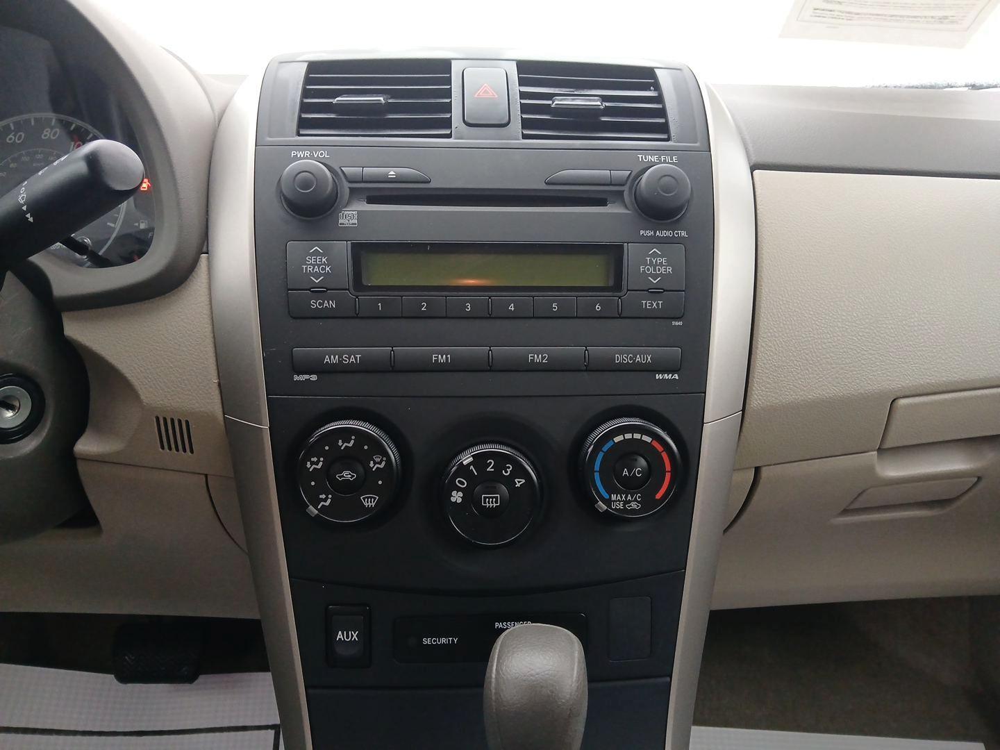 2009 Toyota Corolla LE 4-Speed AT (JTDBL40E79J) with an 1.8L L4 DOHC 16V engine, 4-Speed Automatic transmission, located at 401 Woodman Dr, Riverside, OH, 45431, (937) 908-9800, 39.760899, -84.123421 - Photo#12