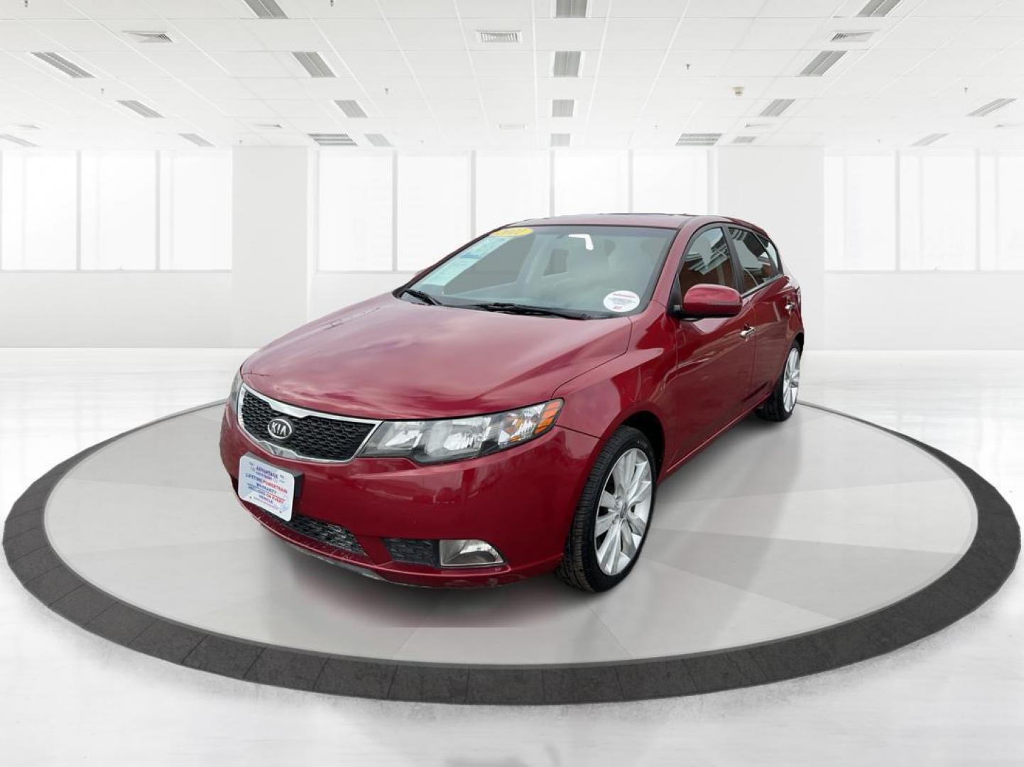 2011 Spicy Red Metallic Kia Forte 5-Door SX (KNAFW5A33B5) with an 2.4L L4 DOHC 16V engine, located at 1230 East Main St, Xenia, OH, 45385, (937) 908-9800, 39.688026, -83.910172 - Photo#7
