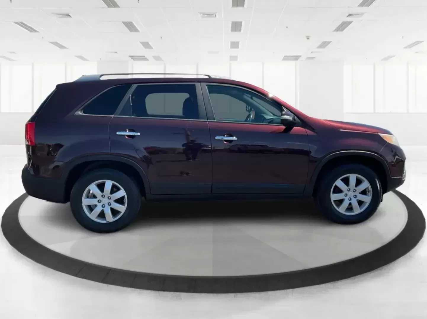 2011 Dark Cherry Kia Sorento LX 2WD (5XYKT3A14BG) with an 2.4L L4 DOHC 16V engine, 6-Speed Automatic transmission, located at 1230 East Main St, Xenia, OH, 45385, (937) 908-9800, 39.688026, -83.910172 - Photo#0
