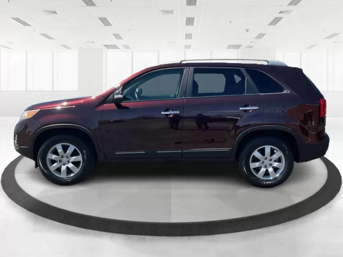 2011 Dark Cherry Kia Sorento LX 2WD (5XYKT3A14BG) with an 2.4L L4 DOHC 16V engine, 6-Speed Automatic transmission, located at 1230 East Main St, Xenia, OH, 45385, (937) 908-9800, 39.688026, -83.910172 - Photo#5
