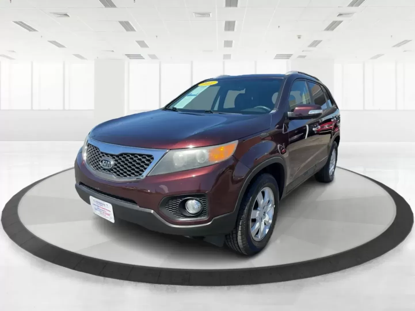 2011 Dark Cherry Kia Sorento LX 2WD (5XYKT3A14BG) with an 2.4L L4 DOHC 16V engine, 6-Speed Automatic transmission, located at 1230 East Main St, Xenia, OH, 45385, (937) 908-9800, 39.688026, -83.910172 - Photo#7