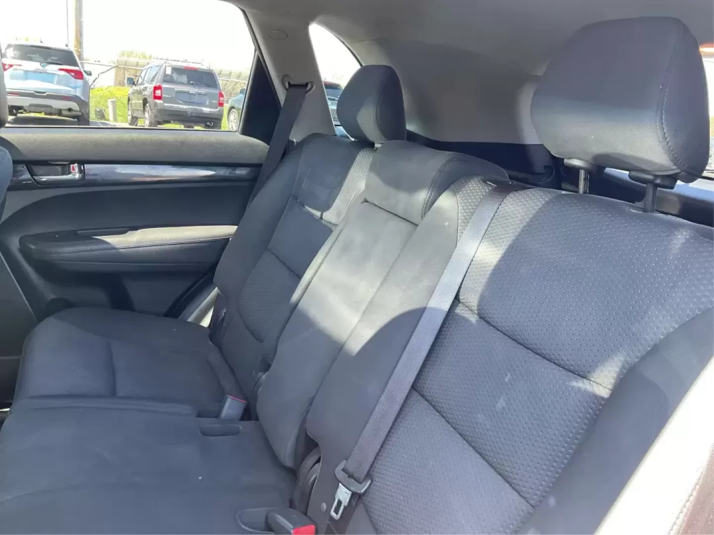 2011 Dark Cherry Kia Sorento LX 2WD (5XYKT3A14BG) with an 2.4L L4 DOHC 16V engine, 6-Speed Automatic transmission, located at 1230 East Main St, Xenia, OH, 45385, (937) 908-9800, 39.688026, -83.910172 - Photo#8