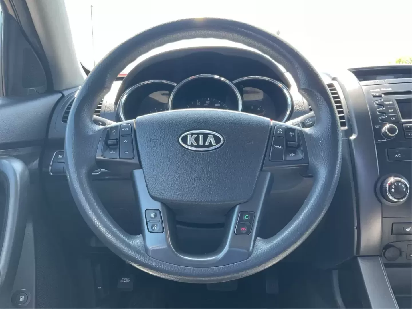 2011 Dark Cherry Kia Sorento LX 2WD (5XYKT3A14BG) with an 2.4L L4 DOHC 16V engine, 6-Speed Automatic transmission, located at 1230 East Main St, Xenia, OH, 45385, (937) 908-9800, 39.688026, -83.910172 - Photo#13