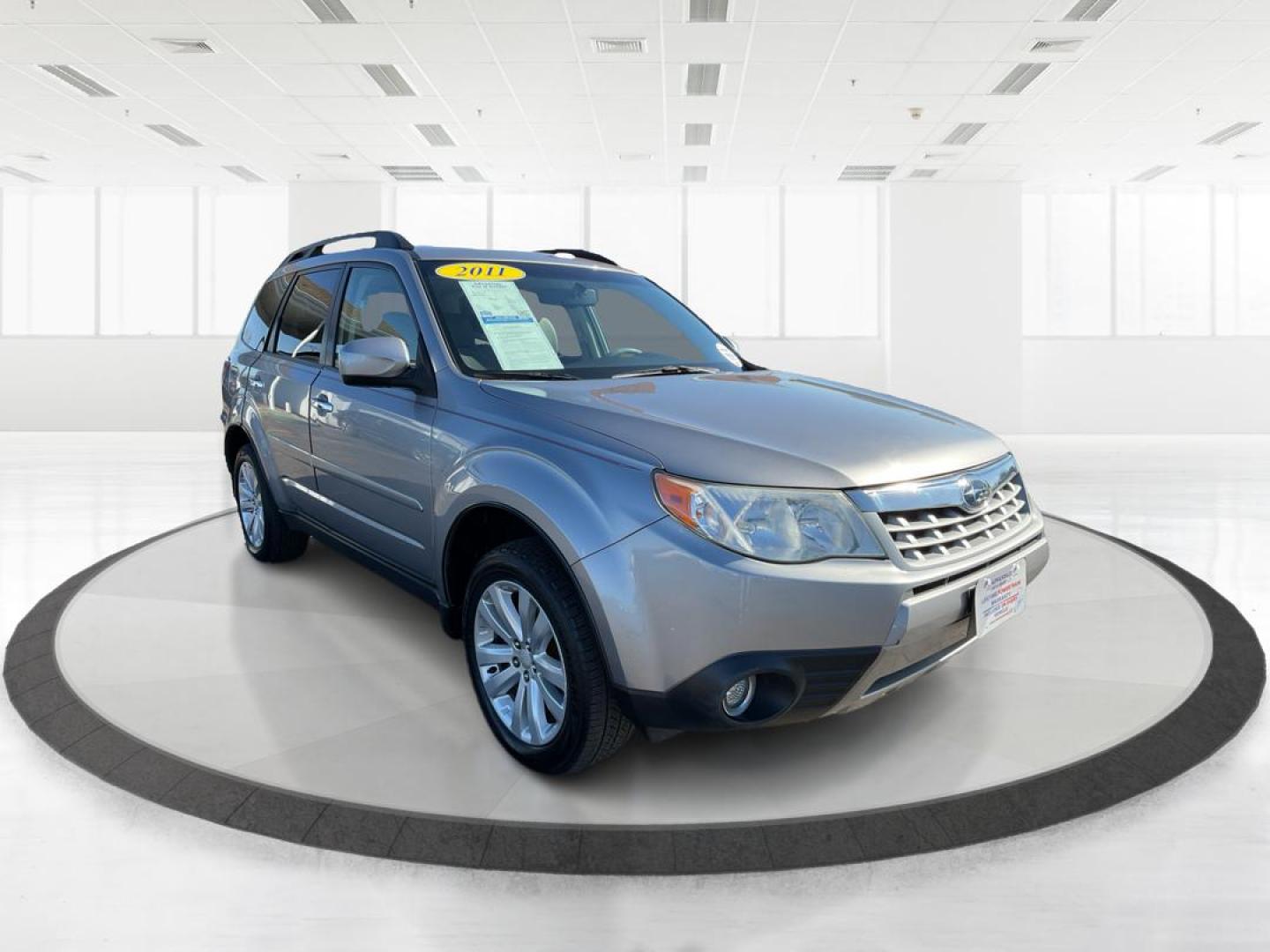2011 Subaru Forester 2.5X Limited (JF2SHAFC9BH) with an 2.5L H-4 DOHC engine, located at 1951 S Dayton Lakeview Rd., New Carlisle, OH, 45344, (937) 908-9800, 39.890999, -84.050255 - Photo#0