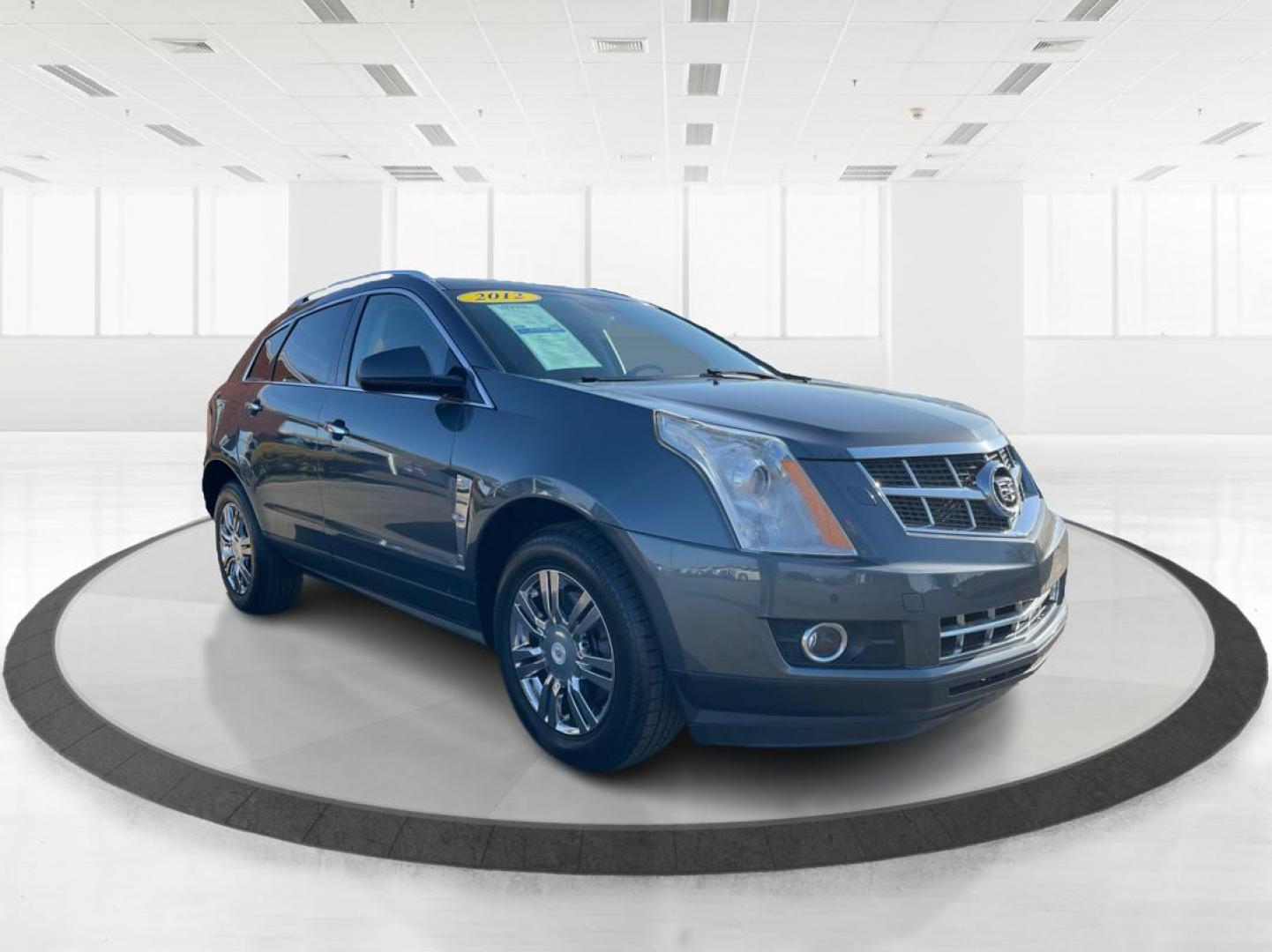 2012 Cadillac SRX Performance Collection (3GYFNEE36CS) with an 3.6L V-6 gasoline direct injection engine, located at 8750 N County Rd 25A, Piqua, OH, 45356, (937) 908-9800, 40.164391, -84.232513 - Photo#0