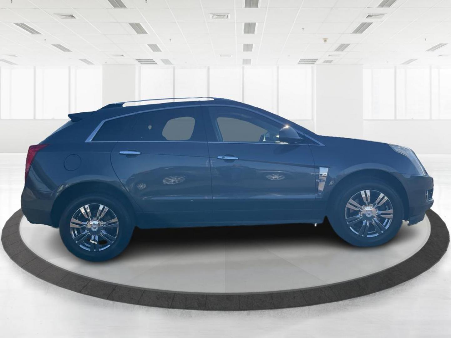 2012 Cadillac SRX Performance Collection (3GYFNEE36CS) with an 3.6L V-6 gasoline direct injection engine, located at 8750 N County Rd 25A, Piqua, OH, 45356, (937) 908-9800, 40.164391, -84.232513 - Photo#1