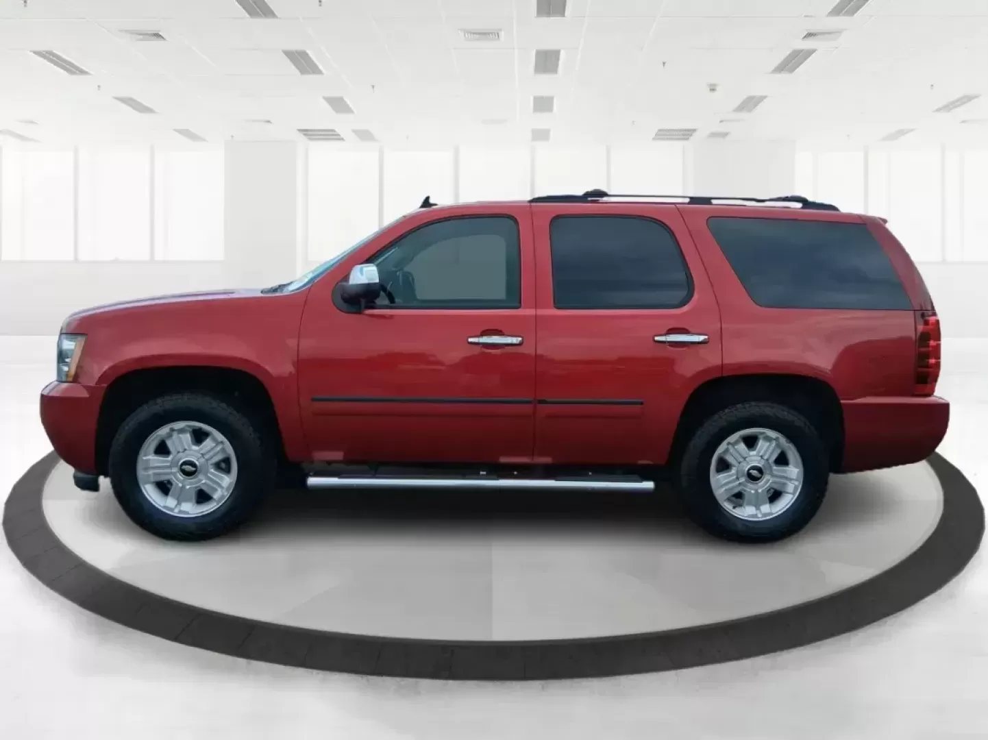 2012 Chevrolet Tahoe LTZ (1GNSKCE09CR) with an Vortec 5.3L V-8 variable valve control engine, located at 8750 N County Rd 25A, Piqua, OH, 45356, (937) 908-9800, 40.164391, -84.232513 - Photo#5