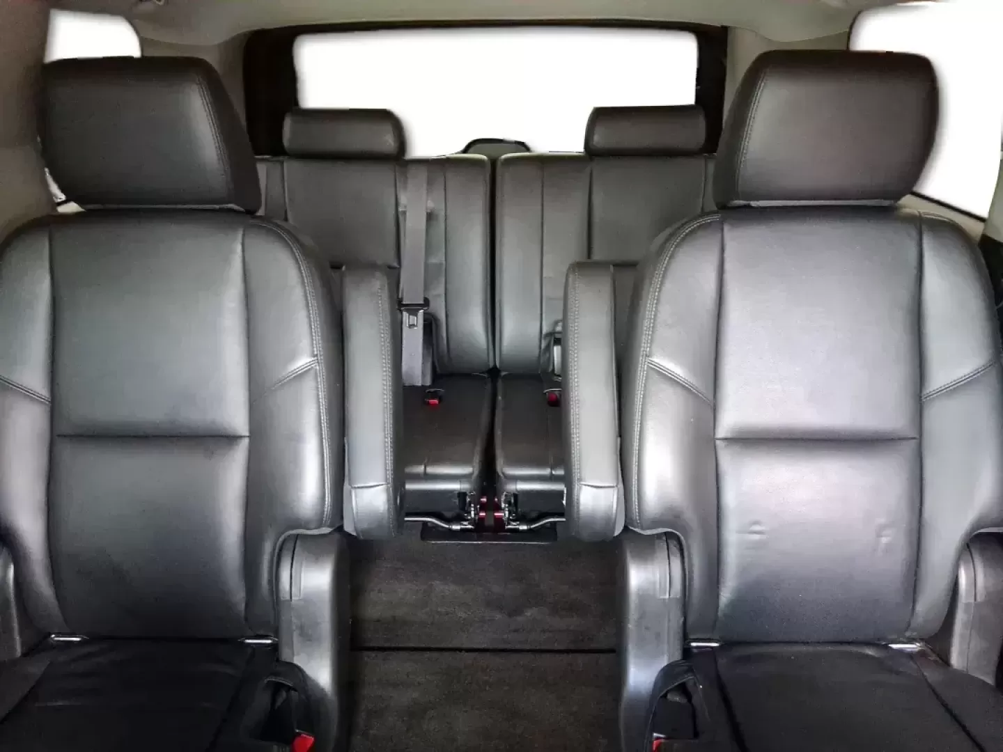2012 Chevrolet Tahoe LTZ (1GNSKCE09CR) with an Vortec 5.3L V-8 variable valve control engine, located at 8750 N County Rd 25A, Piqua, OH, 45356, (937) 908-9800, 40.164391, -84.232513 - Photo#13