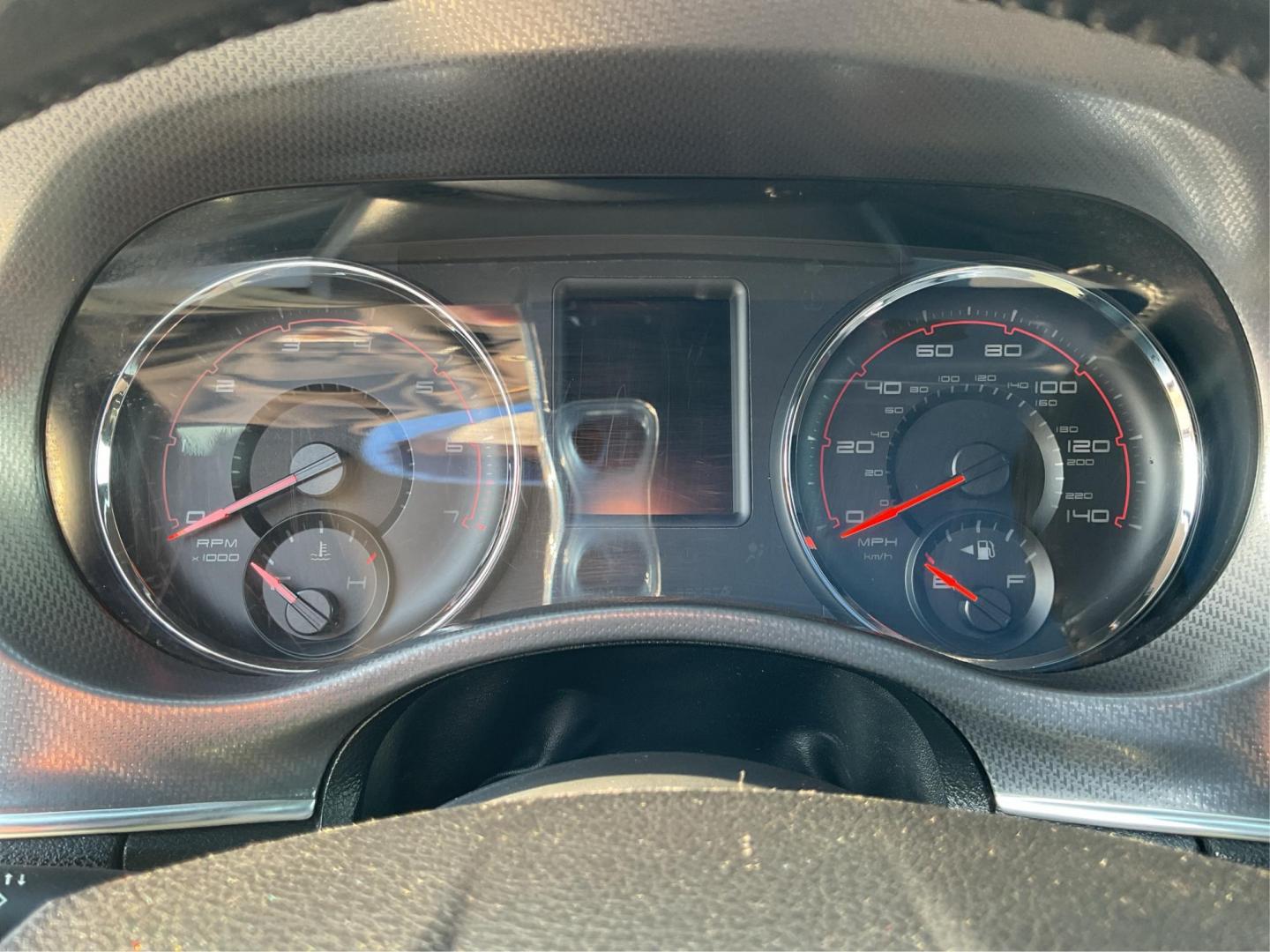 2012 Pitch Black Dodge Charger SE (2C3CDXBGXCH) with an 3.6L V6 DOHC 24V engine, 5-Speed Automatic transmission, located at 401 Woodman Dr, Riverside, OH, 45431, (937) 908-9800, 39.760899, -84.123421 - Photo#14