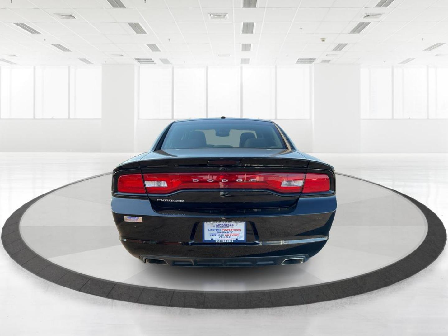 2012 Pitch Black Dodge Charger SE (2C3CDXBGXCH) with an 3.6L V6 DOHC 24V engine, 5-Speed Automatic transmission, located at 401 Woodman Dr, Riverside, OH, 45431, (937) 908-9800, 39.760899, -84.123421 - Photo#3