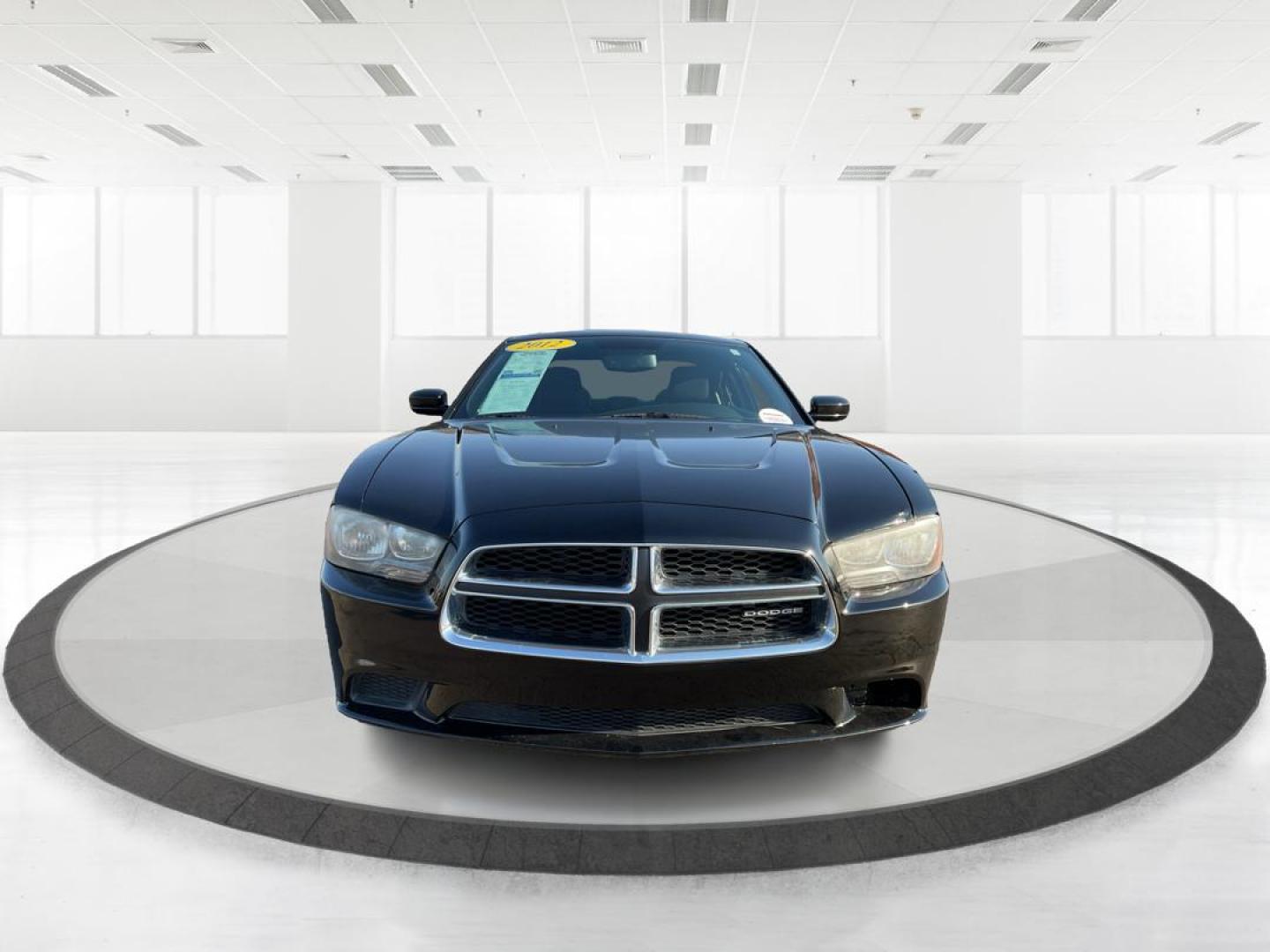 2012 Pitch Black Dodge Charger SE (2C3CDXBGXCH) with an 3.6L V6 DOHC 24V engine, 5-Speed Automatic transmission, located at 401 Woodman Dr, Riverside, OH, 45431, (937) 908-9800, 39.760899, -84.123421 - Photo#6