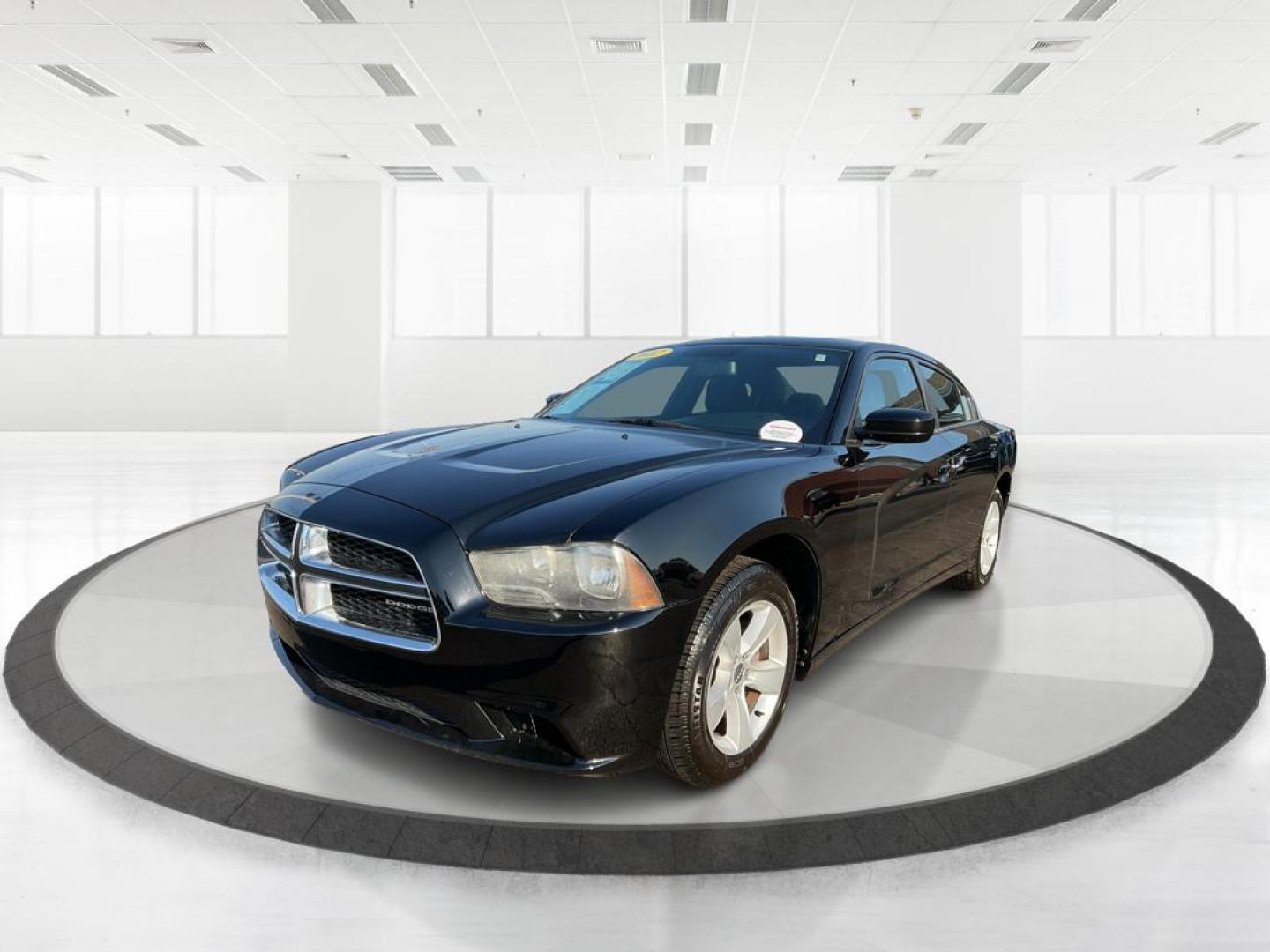 2012 Pitch Black Dodge Charger SE (2C3CDXBGXCH) with an 3.6L V6 DOHC 24V engine, 5-Speed Automatic transmission, located at 401 Woodman Dr, Riverside, OH, 45431, (937) 908-9800, 39.760899, -84.123421 - Photo#7