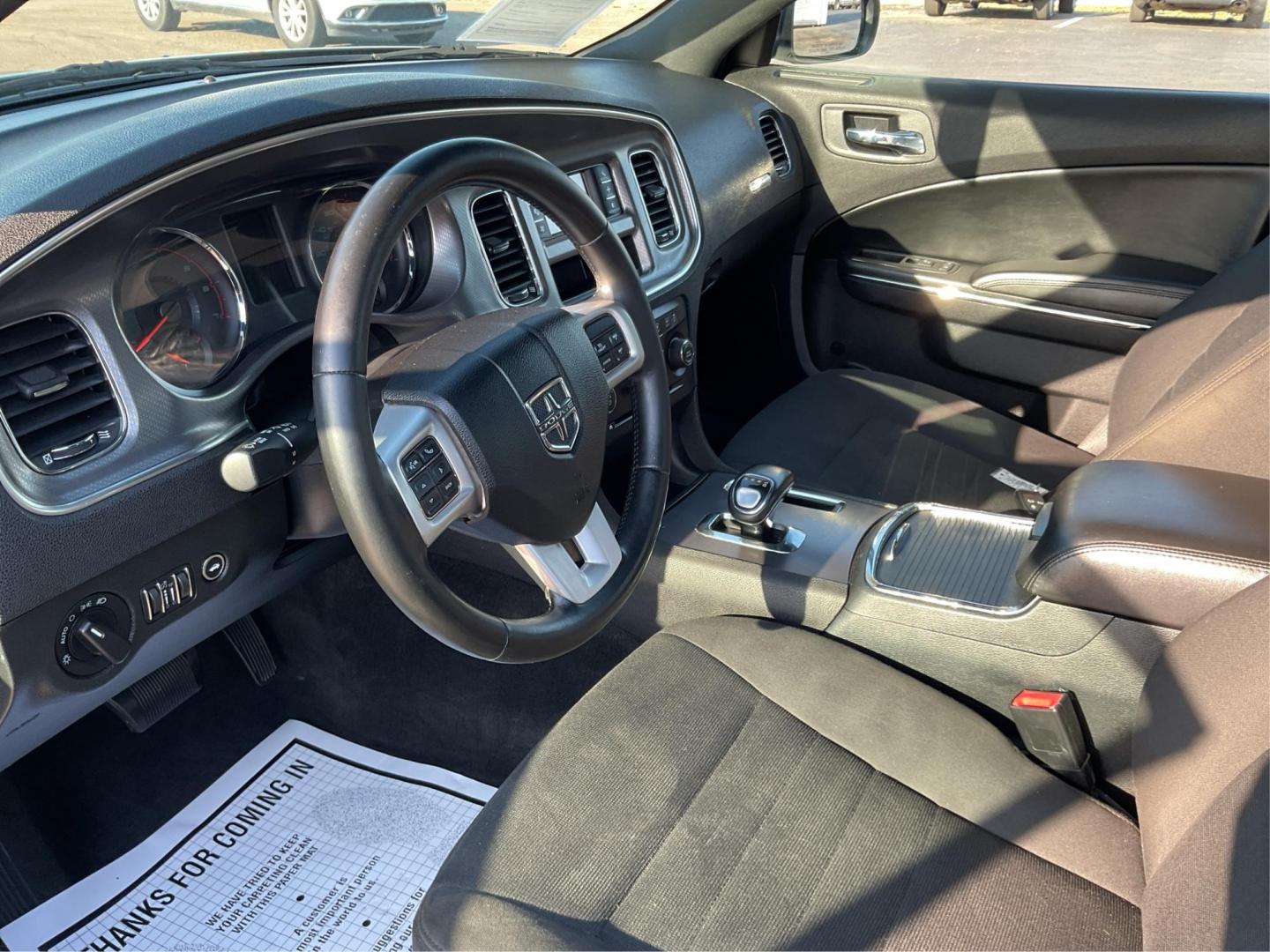 2012 Pitch Black Dodge Charger SE (2C3CDXBGXCH) with an 3.6L V6 DOHC 24V engine, 5-Speed Automatic transmission, located at 401 Woodman Dr, Riverside, OH, 45431, (937) 908-9800, 39.760899, -84.123421 - Photo#8