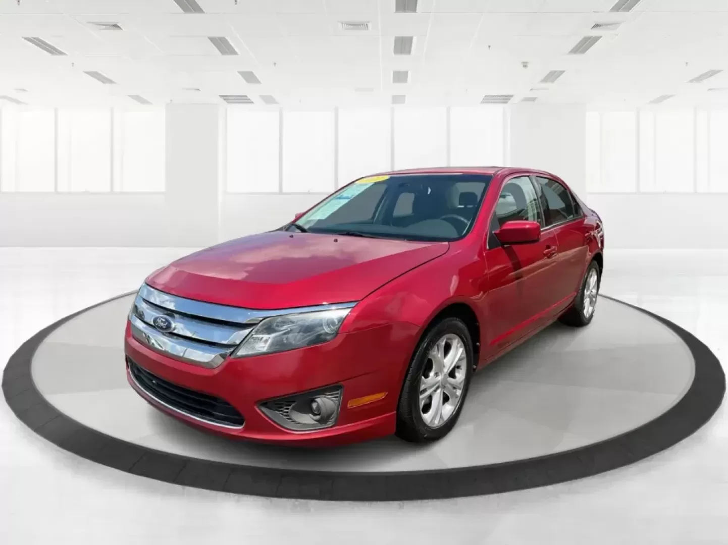 2012 Ford Fusion SE (3FAHP0HA2CR) with an 2.5L L4 DOHC 16V engine, located at 8750 N County Rd 25A, Piqua, OH, 45356, (937) 908-9800, 40.164391, -84.232513 - Photo#7