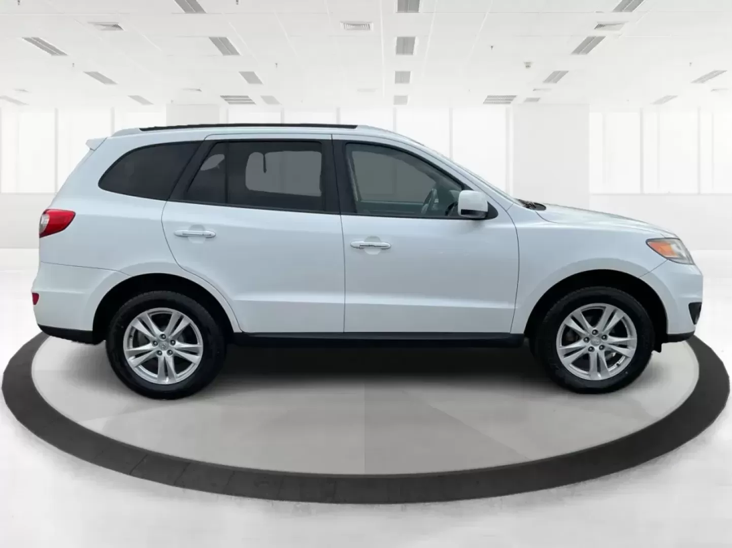 2012 Hyundai Santa Fe Limited V6 (5XYZKDAG5CG) with an 3.5L V-6 DOHC engine, located at 1230 East Main St, Xenia, OH, 45385, (937) 908-9800, 39.688026, -83.910172 - Photo#0