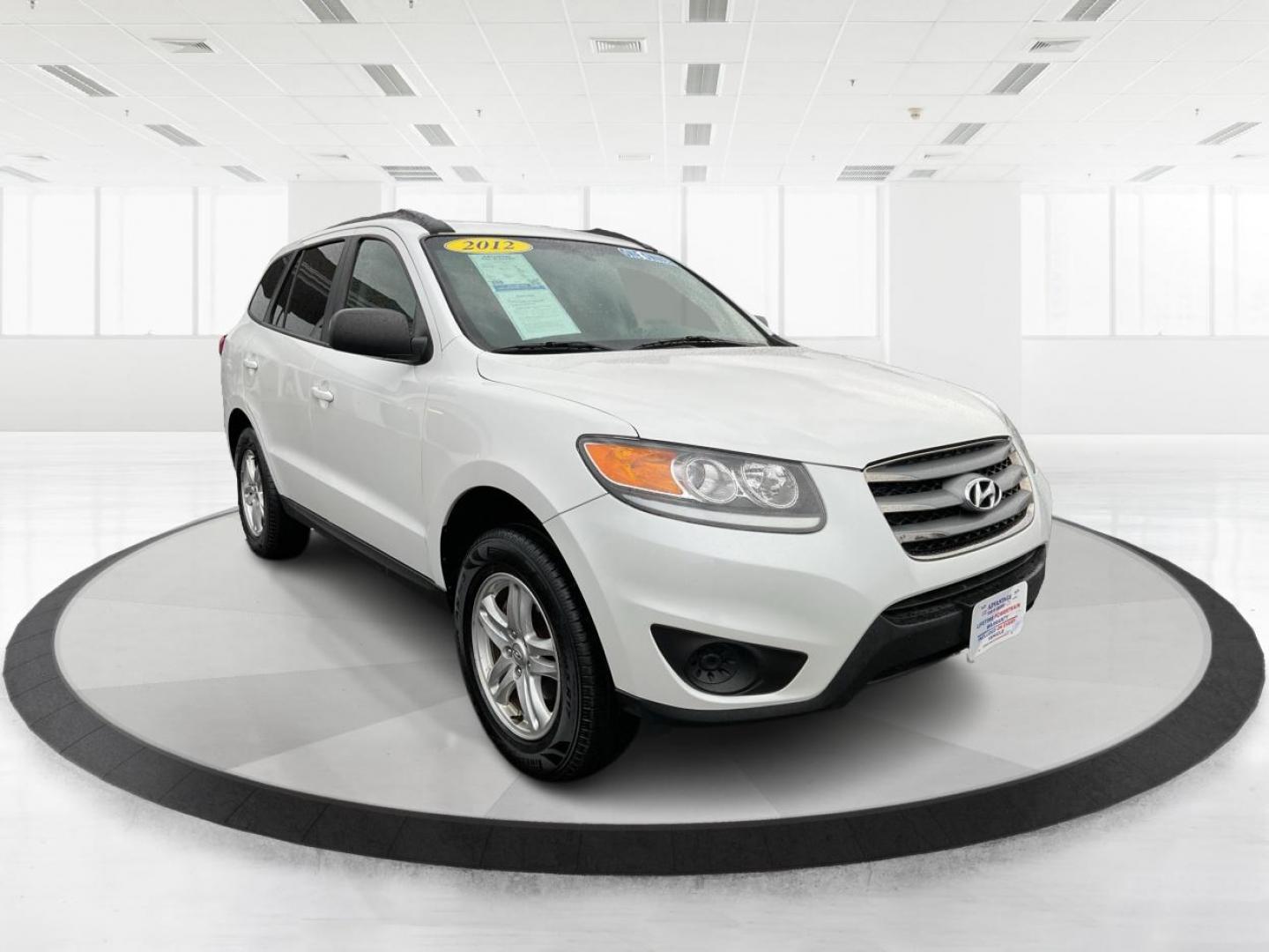 2012 Hyundai Santa Fe GLS (5XYZGDAB5CG) with an 2.4L I-4 DOHC engine, located at 1099 N County Rd 25A , Troy, OH, 45373, (937) 908-9800, 40.057079, -84.212883 - Photo#0