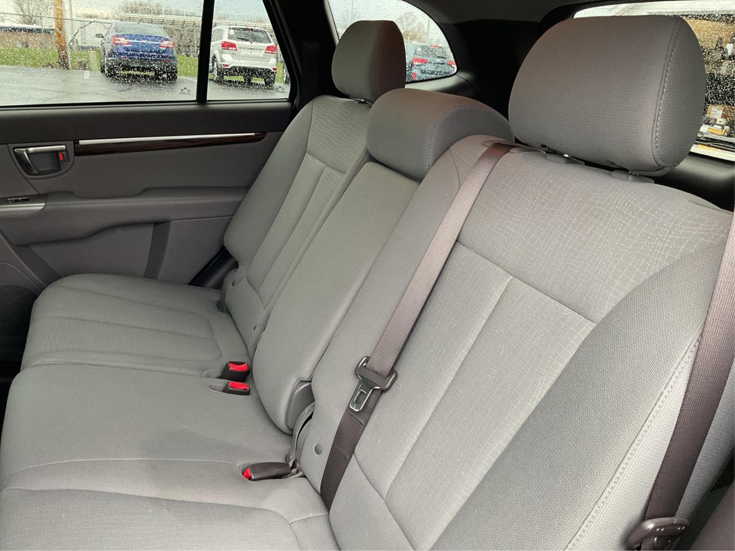 2012 Hyundai Santa Fe GLS (5XYZGDAB5CG) with an 2.4L I-4 DOHC engine, located at 1099 N County Rd 25A , Troy, OH, 45373, (937) 908-9800, 40.057079, -84.212883 - Photo#9