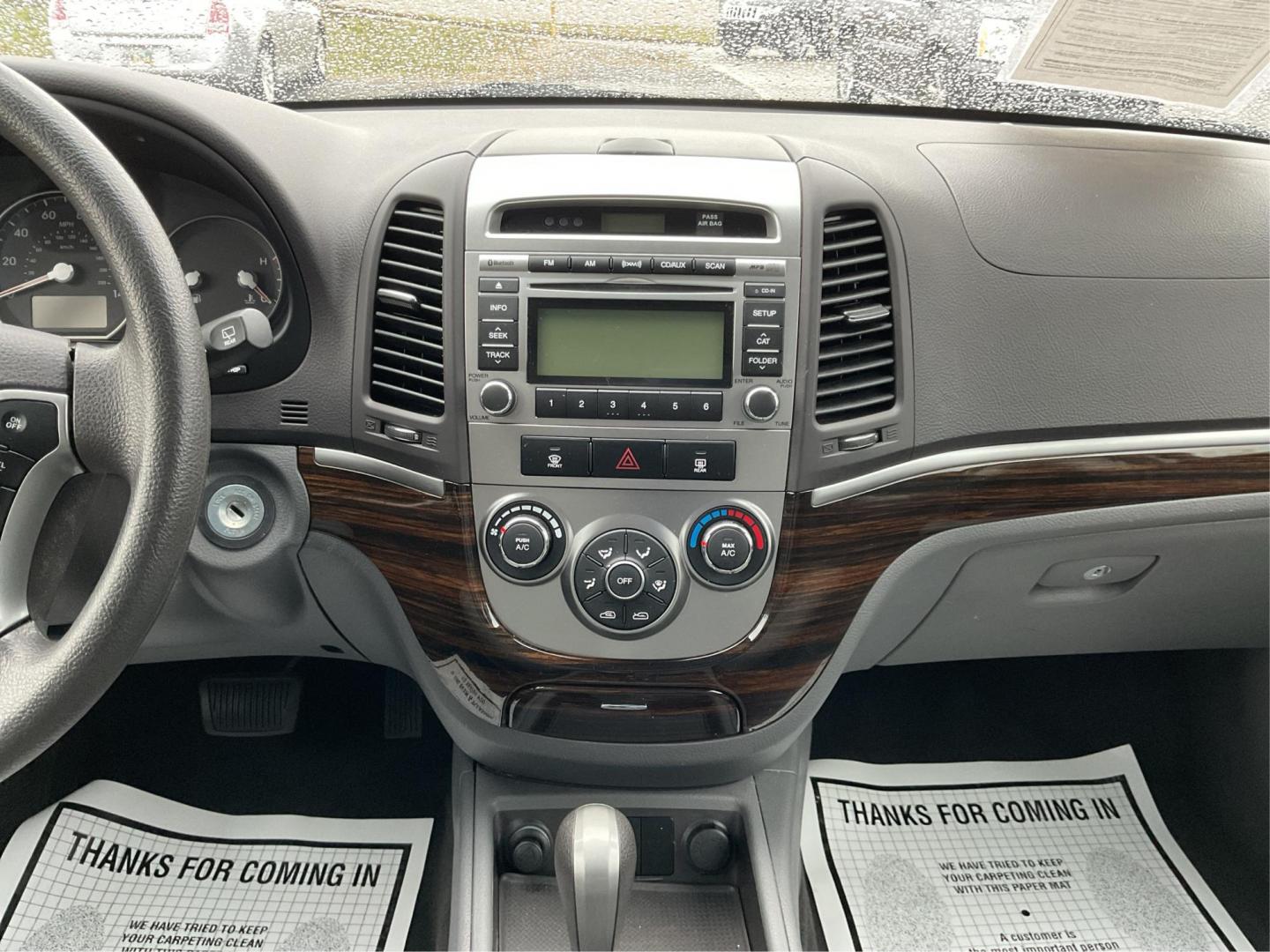 2012 Hyundai Santa Fe GLS (5XYZGDAB5CG) with an 2.4L I-4 DOHC engine, located at 1099 N County Rd 25A , Troy, OH, 45373, (937) 908-9800, 40.057079, -84.212883 - Photo#12