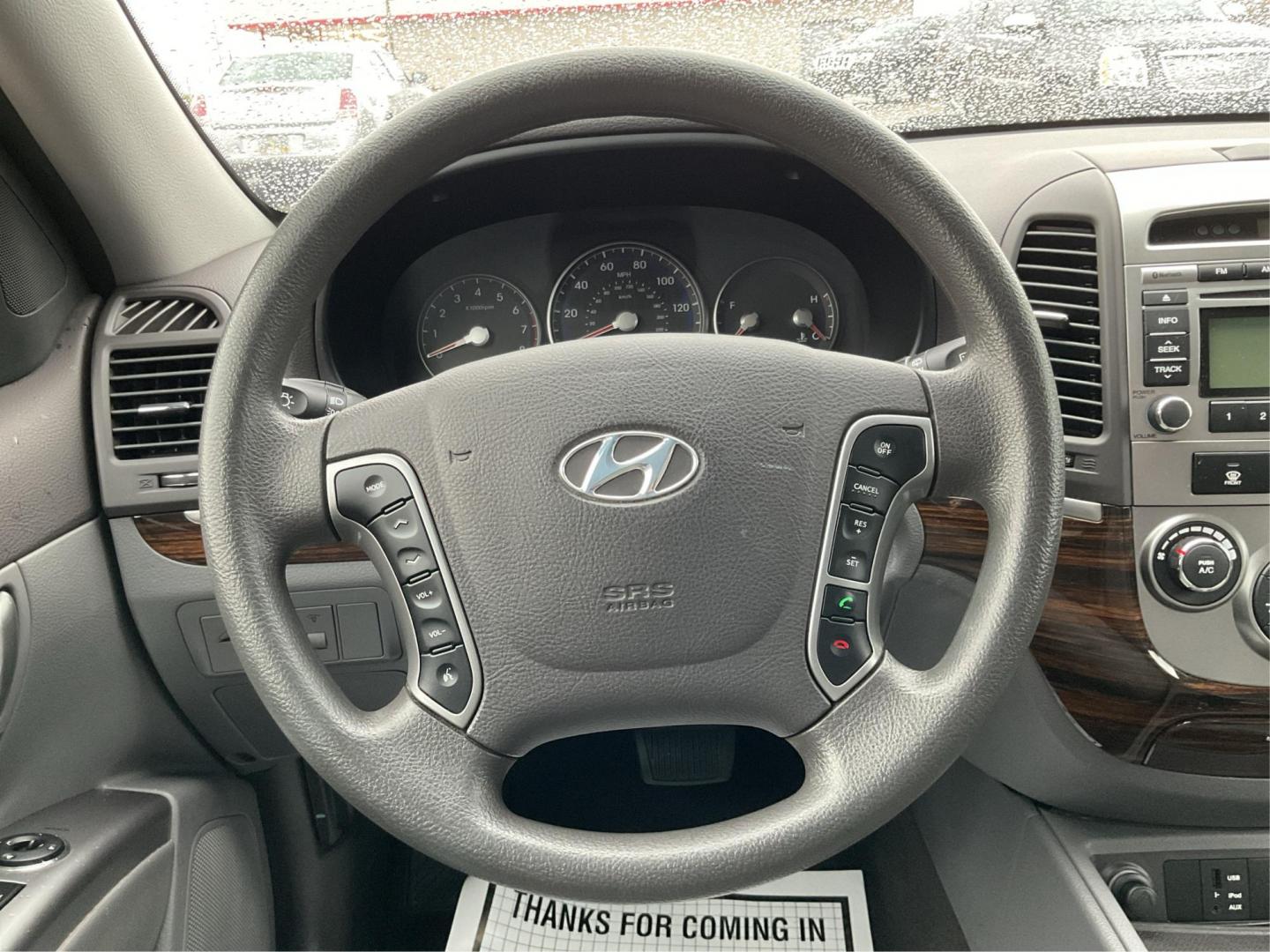 2012 Hyundai Santa Fe GLS (5XYZGDAB5CG) with an 2.4L I-4 DOHC engine, located at 1099 N County Rd 25A , Troy, OH, 45373, (937) 908-9800, 40.057079, -84.212883 - Photo#15