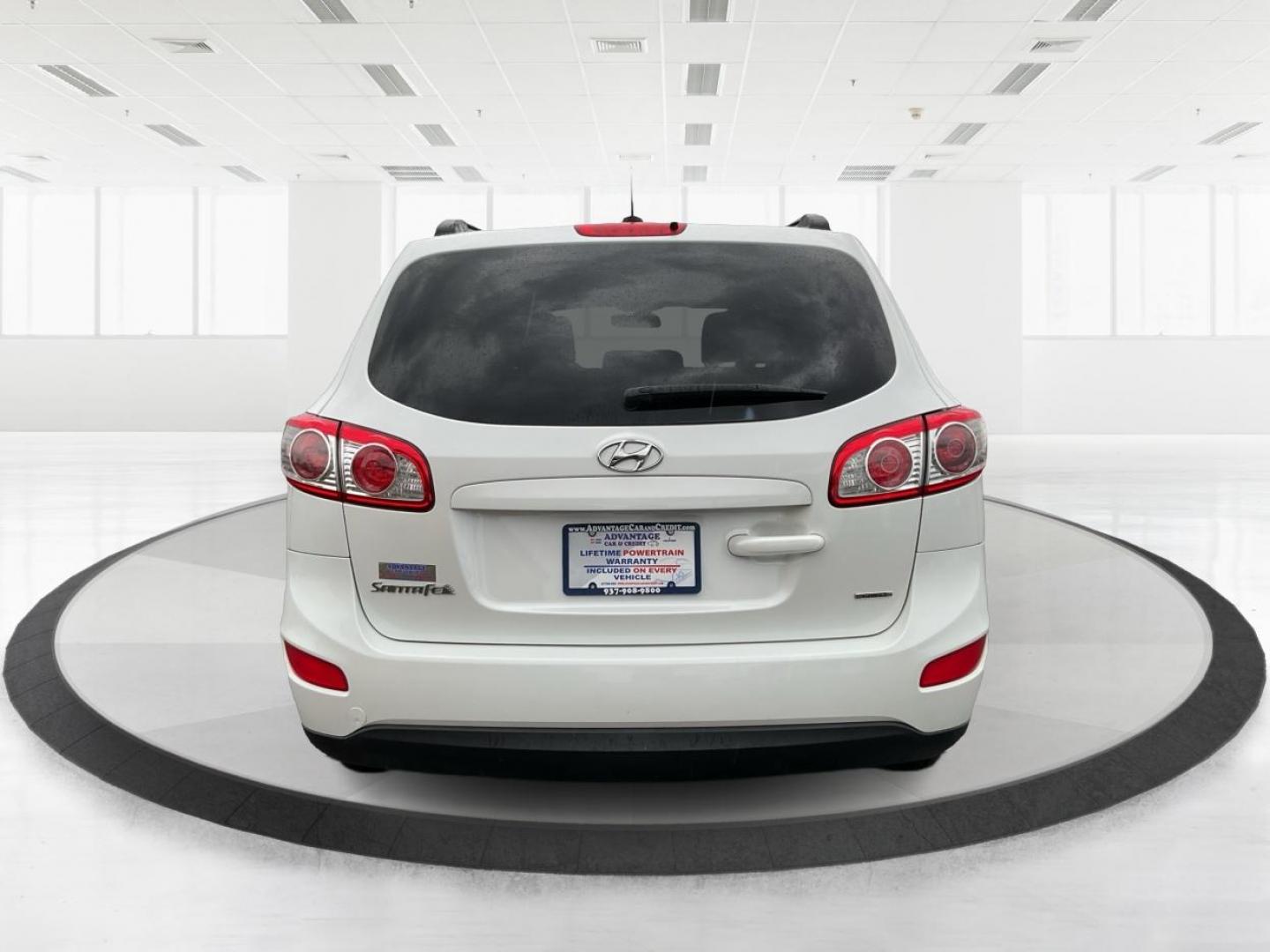 2012 Hyundai Santa Fe GLS (5XYZGDAB5CG) with an 2.4L I-4 DOHC engine, located at 1099 N County Rd 25A , Troy, OH, 45373, (937) 908-9800, 40.057079, -84.212883 - Photo#3