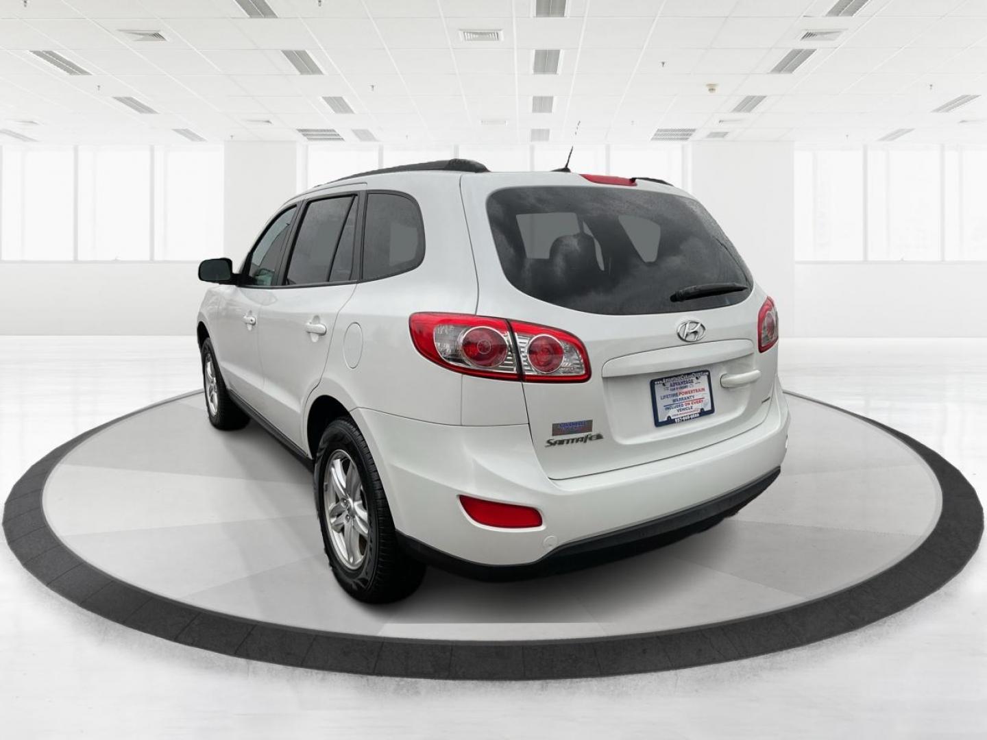 2012 Hyundai Santa Fe GLS (5XYZGDAB5CG) with an 2.4L I-4 DOHC engine, located at 1099 N County Rd 25A , Troy, OH, 45373, (937) 908-9800, 40.057079, -84.212883 - Photo#4