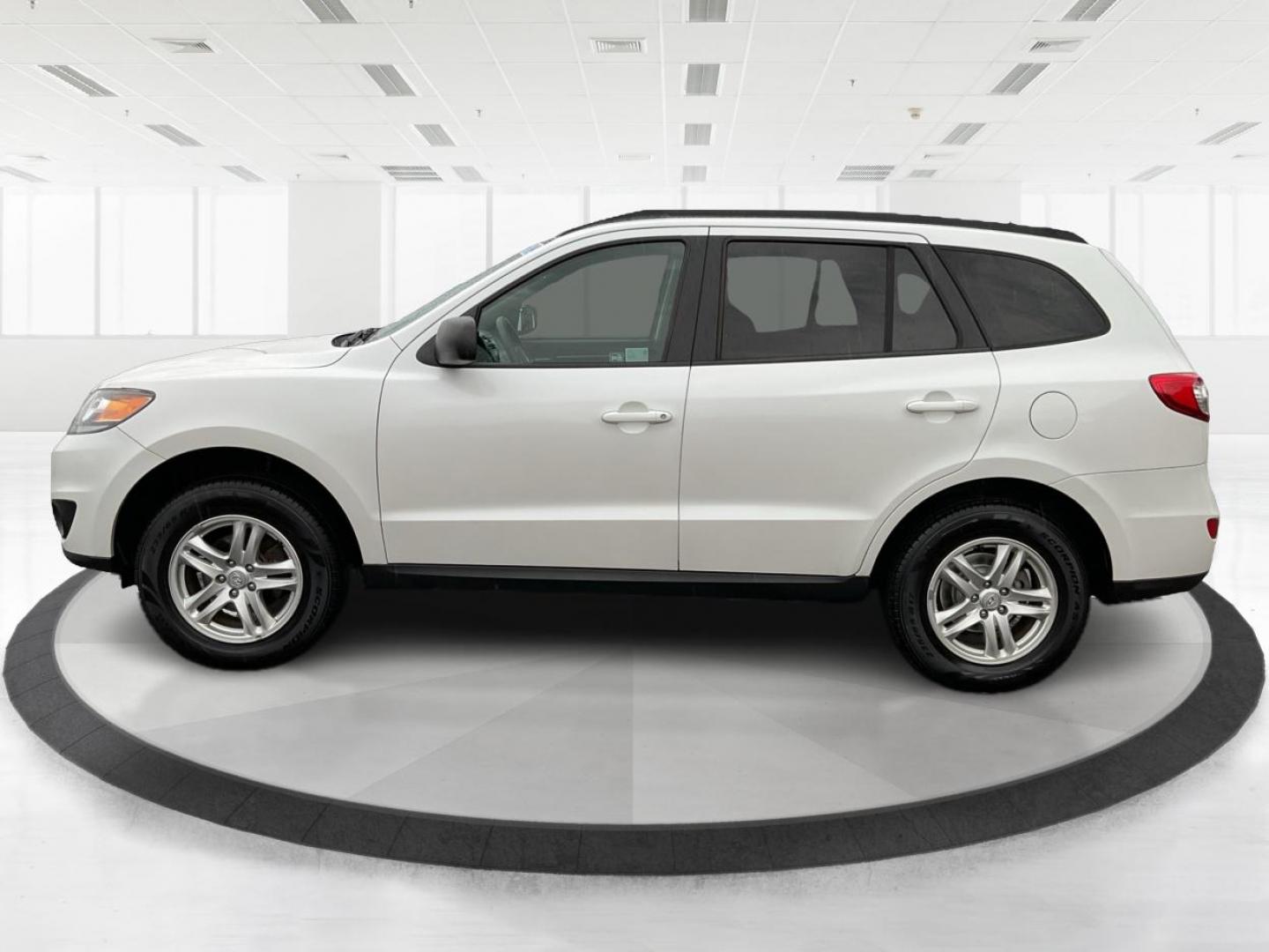 2012 Hyundai Santa Fe GLS (5XYZGDAB5CG) with an 2.4L I-4 DOHC engine, located at 1099 N County Rd 25A , Troy, OH, 45373, (937) 908-9800, 40.057079, -84.212883 - Photo#5