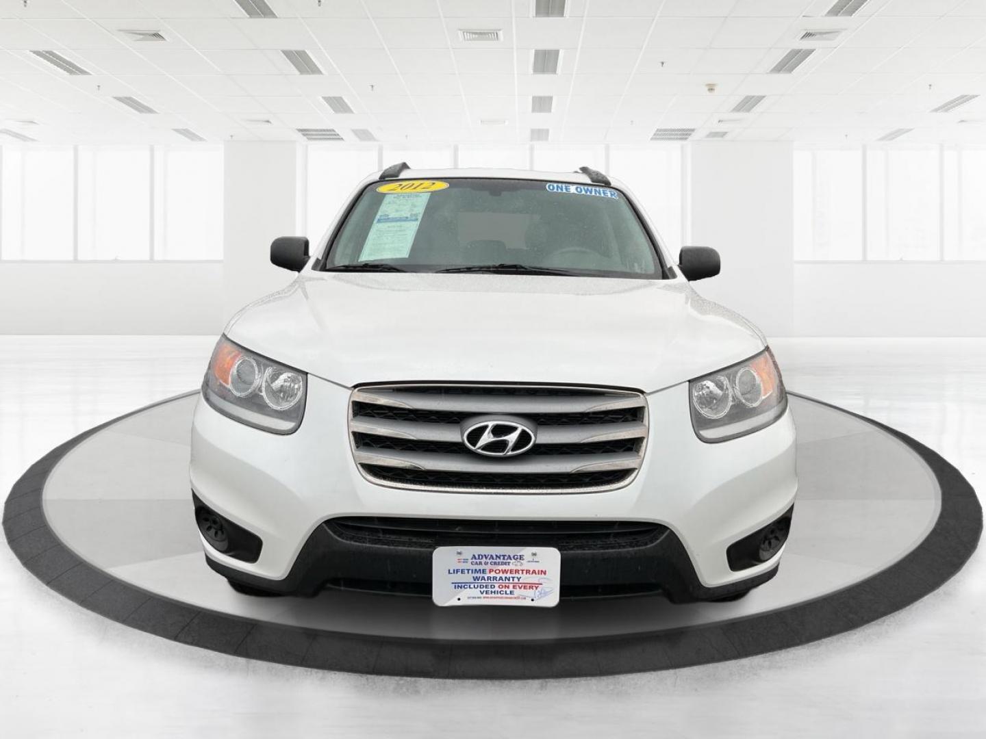 2012 Hyundai Santa Fe GLS (5XYZGDAB5CG) with an 2.4L I-4 DOHC engine, located at 1099 N County Rd 25A , Troy, OH, 45373, (937) 908-9800, 40.057079, -84.212883 - Photo#6