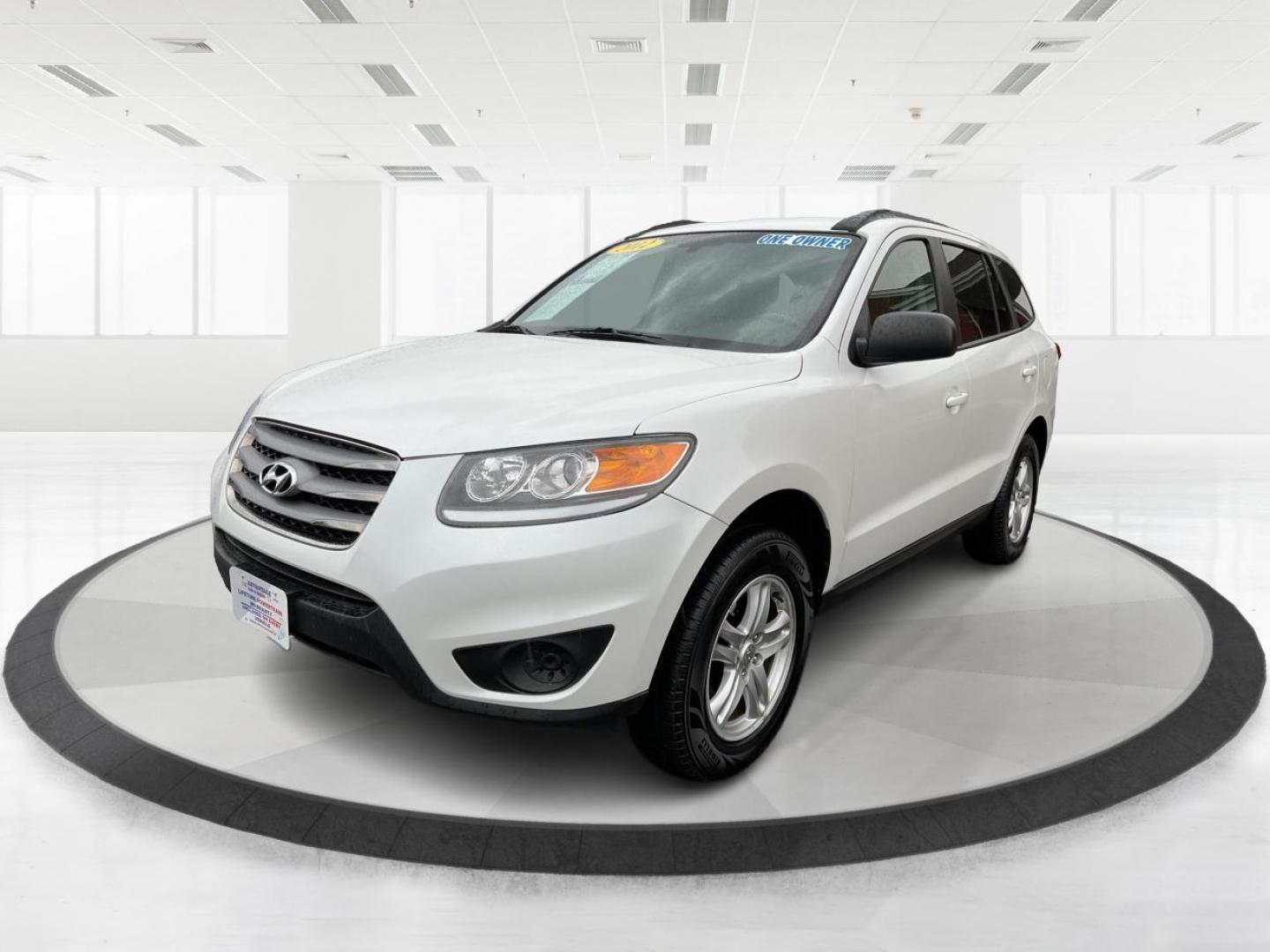 2012 Hyundai Santa Fe GLS (5XYZGDAB5CG) with an 2.4L I-4 DOHC engine, located at 1099 N County Rd 25A , Troy, OH, 45373, (937) 908-9800, 40.057079, -84.212883 - Photo#7