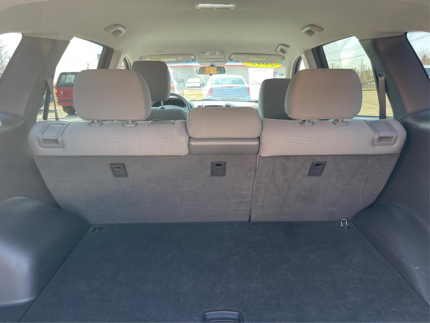 2012 Hyundai Santa Fe GLS (5XYZG3ABXCG) with an 2.4L I-4 DOHC engine, located at 401 Woodman Dr, Riverside, OH, 45431, (937) 908-9800, 39.760899, -84.123421 - Photo#10