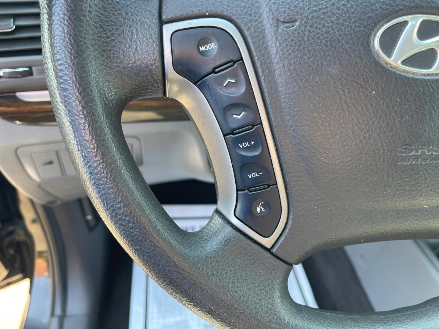 2012 Hyundai Santa Fe GLS (5XYZG3ABXCG) with an 2.4L I-4 DOHC engine, located at 401 Woodman Dr, Riverside, OH, 45431, (937) 908-9800, 39.760899, -84.123421 - Photo#14