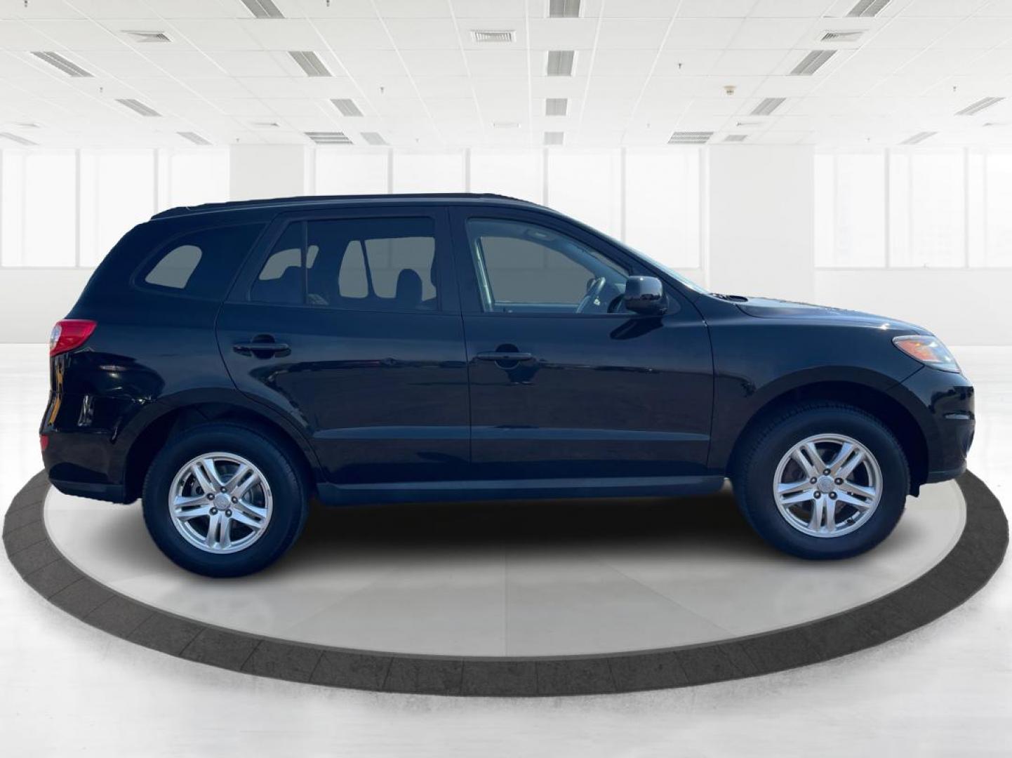 2012 Hyundai Santa Fe GLS (5XYZG3ABXCG) with an 2.4L I-4 DOHC engine, located at 401 Woodman Dr, Riverside, OH, 45431, (937) 908-9800, 39.760899, -84.123421 - Photo#1