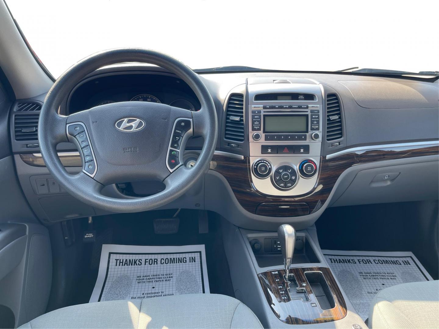 2012 Hyundai Santa Fe GLS (5XYZG3ABXCG) with an 2.4L I-4 DOHC engine, located at 401 Woodman Dr, Riverside, OH, 45431, (937) 908-9800, 39.760899, -84.123421 - Photo#19