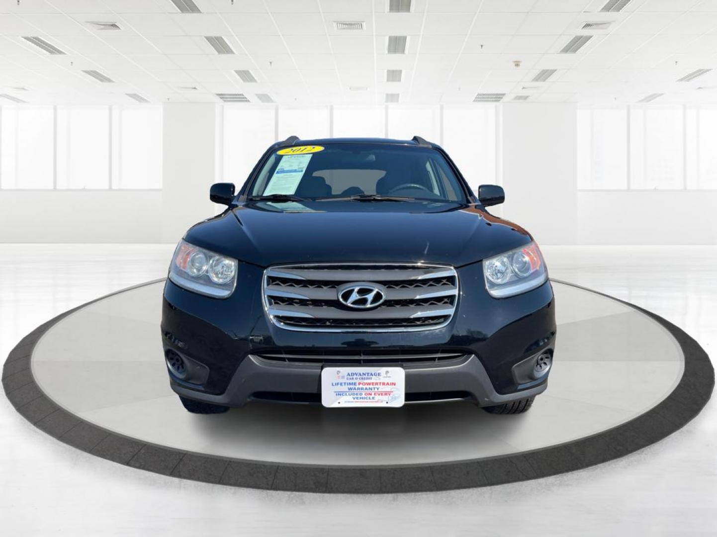 2012 Hyundai Santa Fe GLS (5XYZG3ABXCG) with an 2.4L I-4 DOHC engine, located at 401 Woodman Dr, Riverside, OH, 45431, (937) 908-9800, 39.760899, -84.123421 - Photo#6