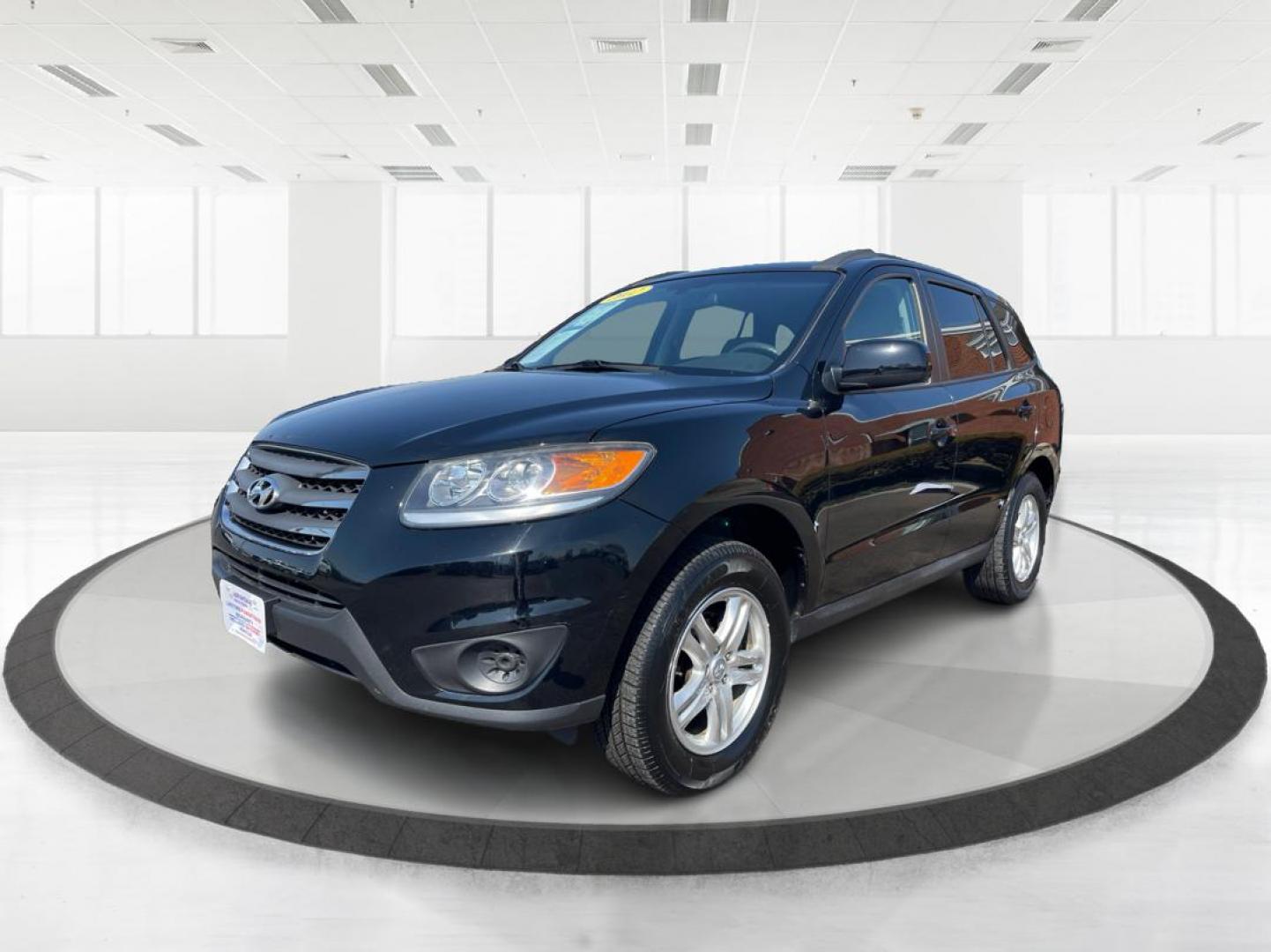 2012 Hyundai Santa Fe GLS (5XYZG3ABXCG) with an 2.4L I-4 DOHC engine, located at 401 Woodman Dr, Riverside, OH, 45431, (937) 908-9800, 39.760899, -84.123421 - Photo#7