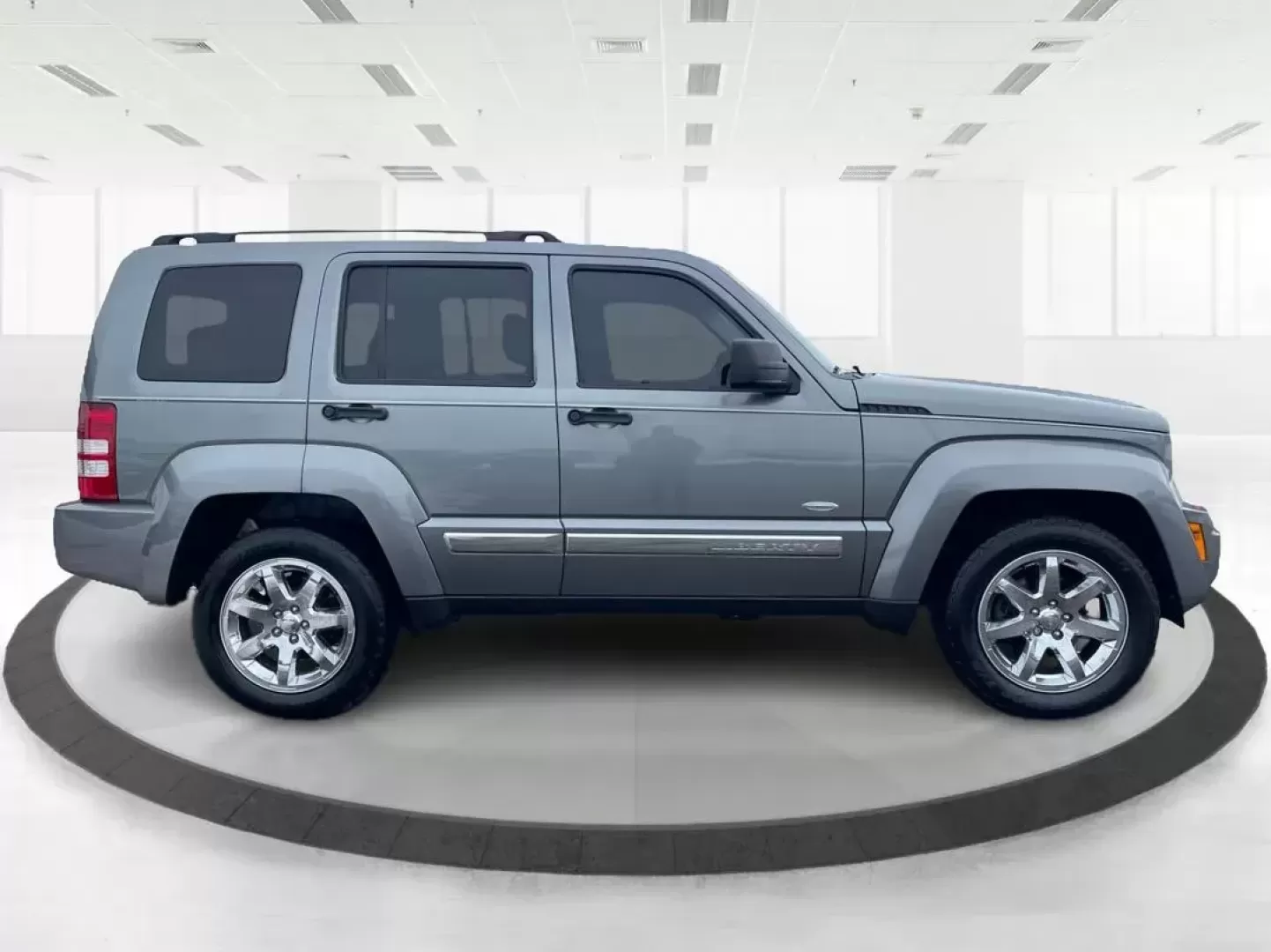2012 Jeep Liberty Sport 4WD (1C4PJMAK8CW) with an 3.7L V6 SOHC 12V engine, 4-Speed Automatic transmission, located at 1099 N County Rd 25A , Troy, OH, 45373, (937) 908-9800, 40.057079, -84.212883 - Photo#1