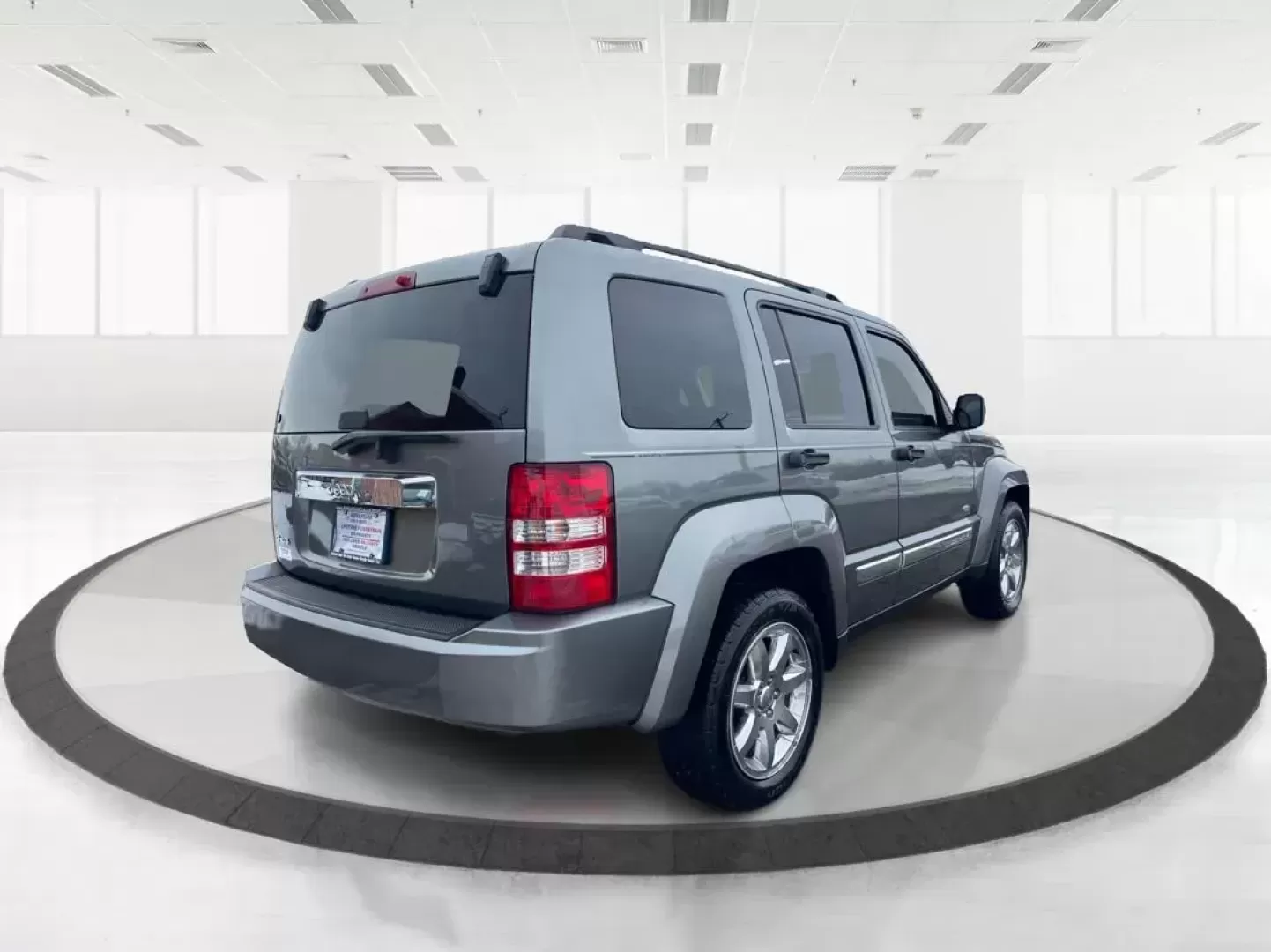 2012 Jeep Liberty Sport 4WD (1C4PJMAK8CW) with an 3.7L V6 SOHC 12V engine, 4-Speed Automatic transmission, located at 1099 N County Rd 25A , Troy, OH, 45373, (937) 908-9800, 40.057079, -84.212883 - Photo#2