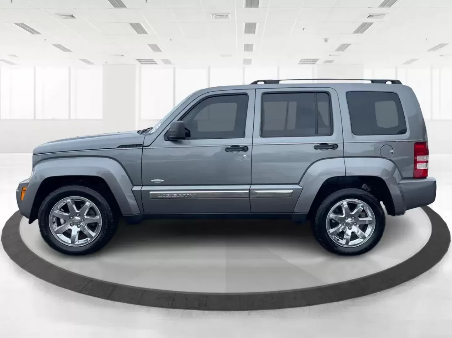 2012 Jeep Liberty Sport 4WD (1C4PJMAK8CW) with an 3.7L V6 SOHC 12V engine, 4-Speed Automatic transmission, located at 1099 N County Rd 25A , Troy, OH, 45373, (937) 908-9800, 40.057079, -84.212883 - Photo#5