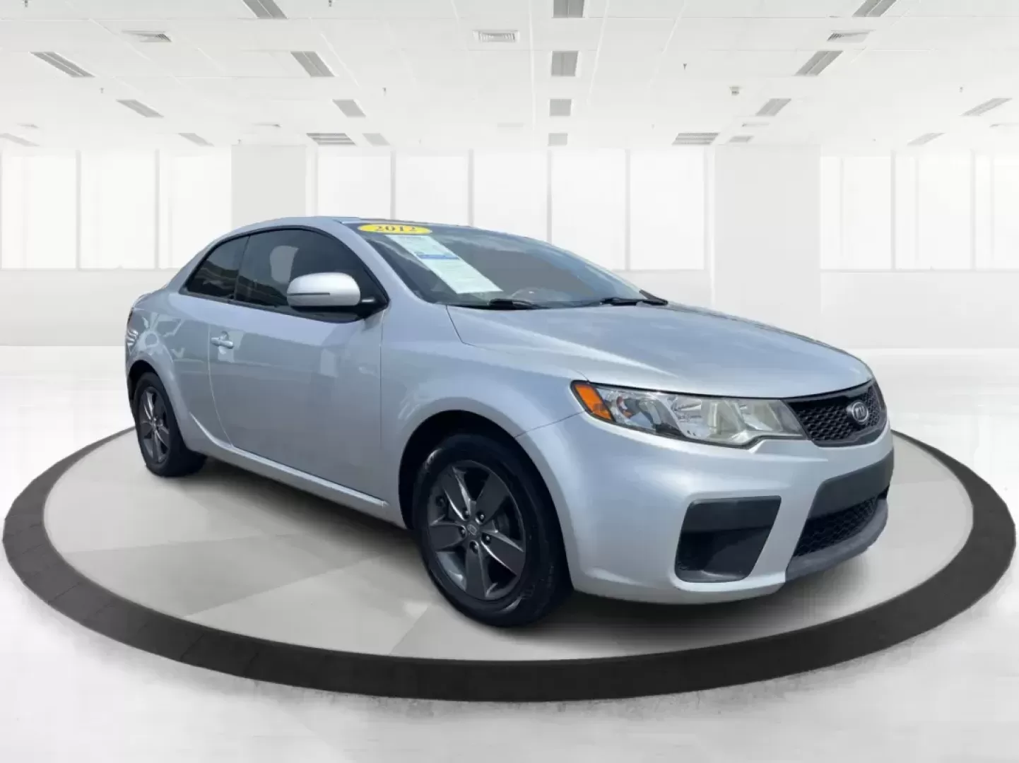 2012 Kia Forte Koup EX (KNAFU6A20C5) with an 2L I-4 DOHC engine, located at 8750 N County Rd 25A, Piqua, OH, 45356, (937) 908-9800, 40.164391, -84.232513 - Photo#0