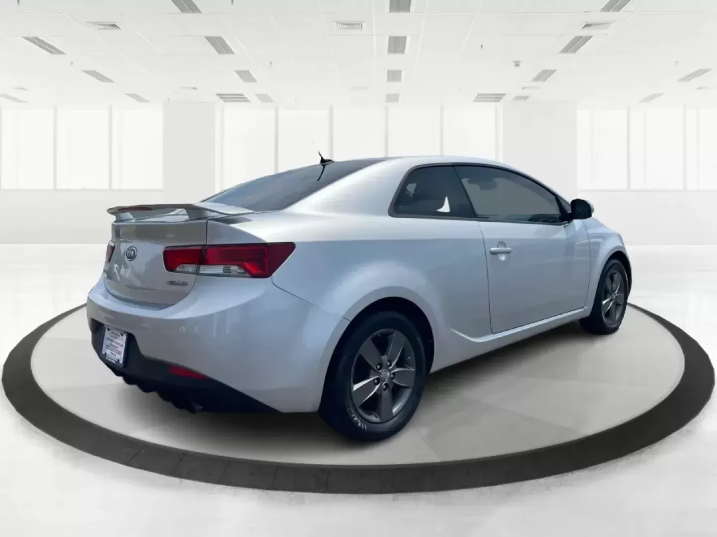 2012 Kia Forte Koup EX (KNAFU6A20C5) with an 2L I-4 DOHC engine, located at 8750 N County Rd 25A, Piqua, OH, 45356, (937) 908-9800, 40.164391, -84.232513 - Photo#2