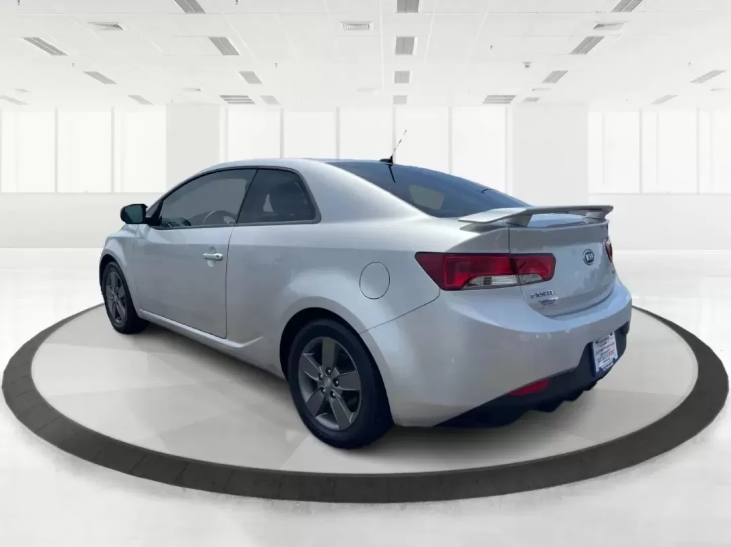2012 Kia Forte Koup EX (KNAFU6A20C5) with an 2L I-4 DOHC engine, located at 8750 N County Rd 25A, Piqua, OH, 45356, (937) 908-9800, 40.164391, -84.232513 - Photo#4