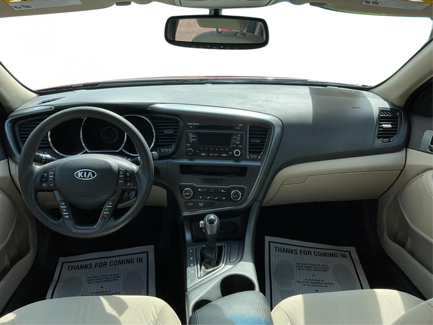 2012 Spicy Red Metallic Kia Optima LX AT (5XXGM4A73CG) with an 2.4L L4 DOHC 16V engine, 6-Speed Automatic transmission, located at 1099 N County Rd 25A , Troy, OH, 45373, (937) 908-9800, 40.057079, -84.212883 - Photo#19