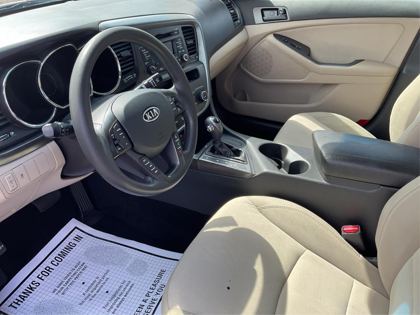 2012 Spicy Red Metallic Kia Optima LX AT (5XXGM4A73CG) with an 2.4L L4 DOHC 16V engine, 6-Speed Automatic transmission, located at 1099 N County Rd 25A , Troy, OH, 45373, (937) 908-9800, 40.057079, -84.212883 - Photo#8