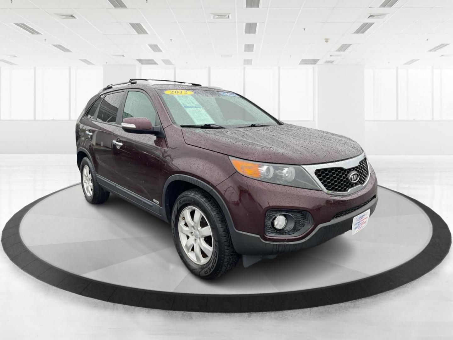 2012 Kia Sorento LX (5XYKTDA6XCG) with an 2.4L I-4 gasoline direct injection engine, located at 880 E. National Road, Vandalia, OH, 45377, (937) 908-9800, 39.891918, -84.183594 - Photo#0