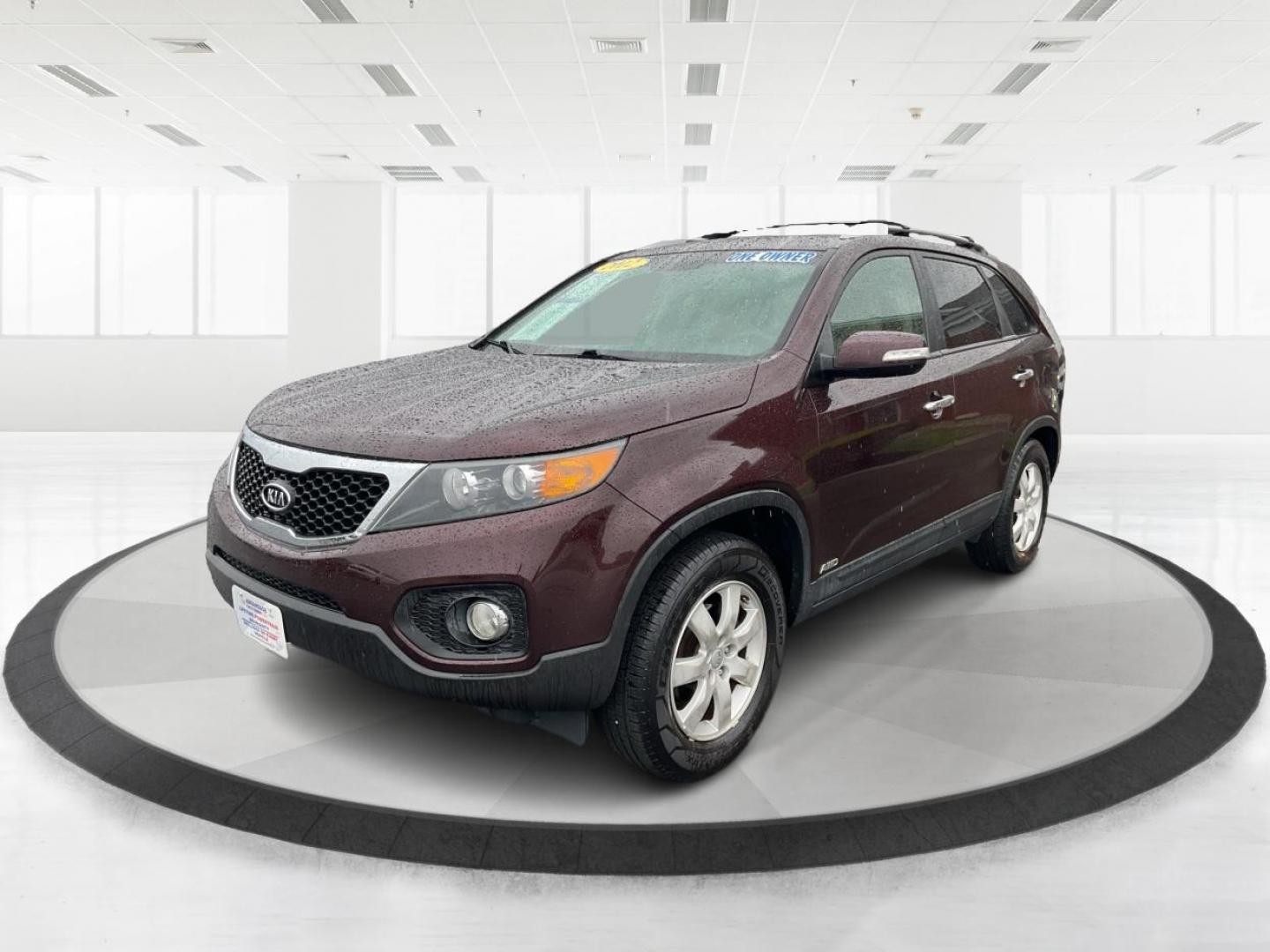 2012 Kia Sorento LX (5XYKTDA6XCG) with an 2.4L I-4 gasoline direct injection engine, located at 880 E. National Road, Vandalia, OH, 45377, (937) 908-9800, 39.891918, -84.183594 - Photo#8