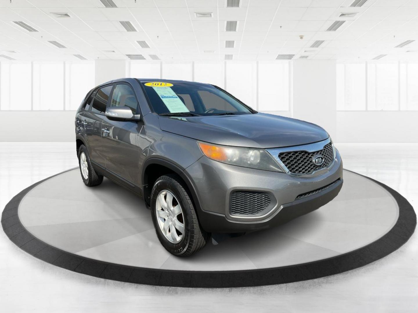 2012 Kia Sorento LX (5XYKT3A17CG) with an 2.4L I-4 DOHC engine, located at 401 Woodman Dr, Riverside, OH, 45431, (937) 908-9800, 39.760899, -84.123421 - Photo#0