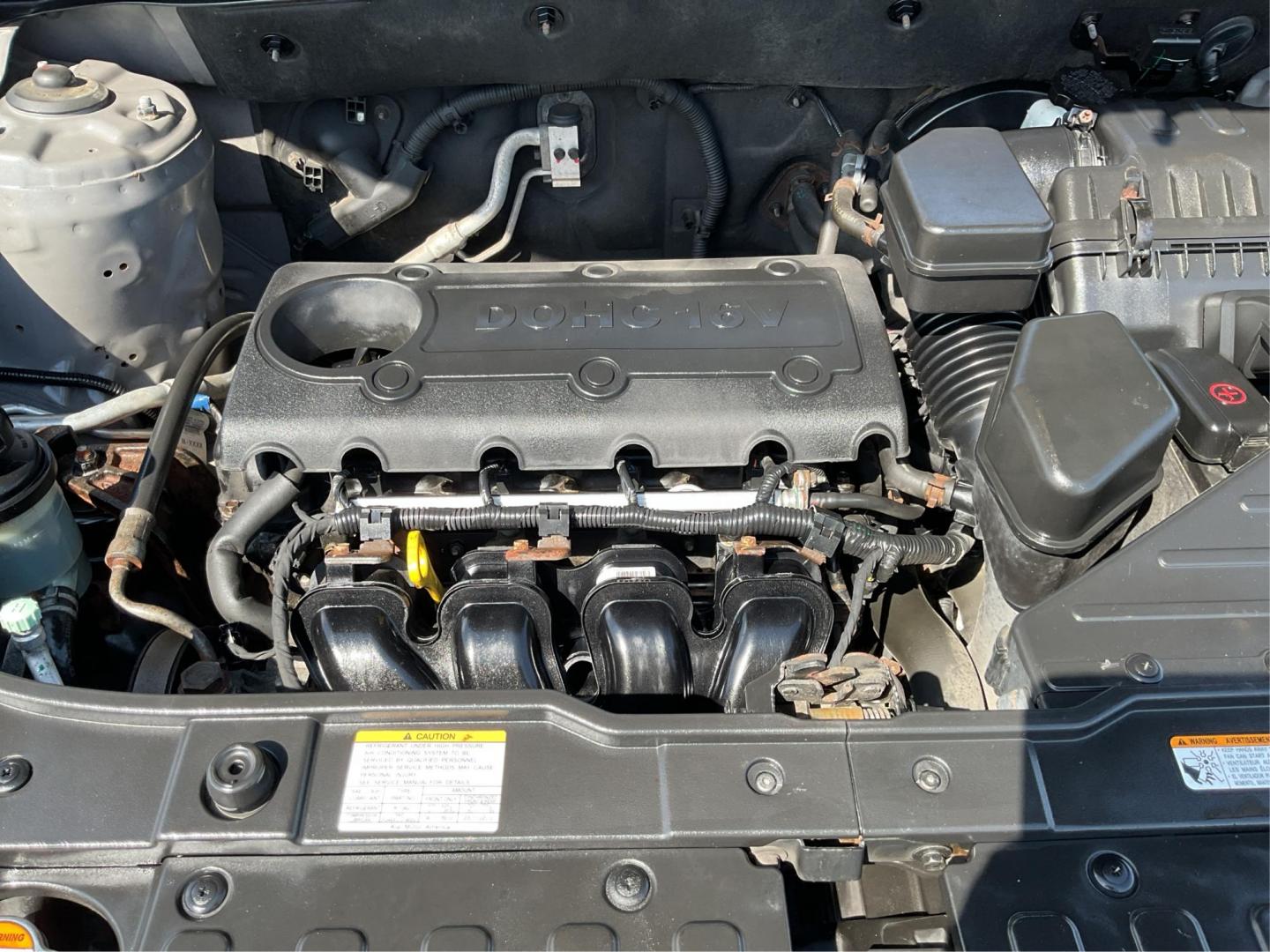 2012 Kia Sorento LX (5XYKT3A17CG) with an 2.4L I-4 DOHC engine, located at 401 Woodman Dr, Riverside, OH, 45431, (937) 908-9800, 39.760899, -84.123421 - Photo#10