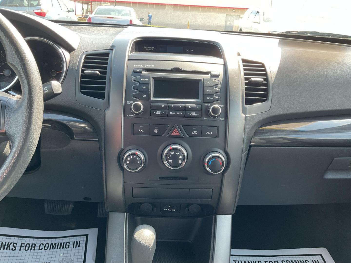2012 Kia Sorento LX (5XYKT3A17CG) with an 2.4L I-4 DOHC engine, located at 401 Woodman Dr, Riverside, OH, 45431, (937) 908-9800, 39.760899, -84.123421 - Photo#12