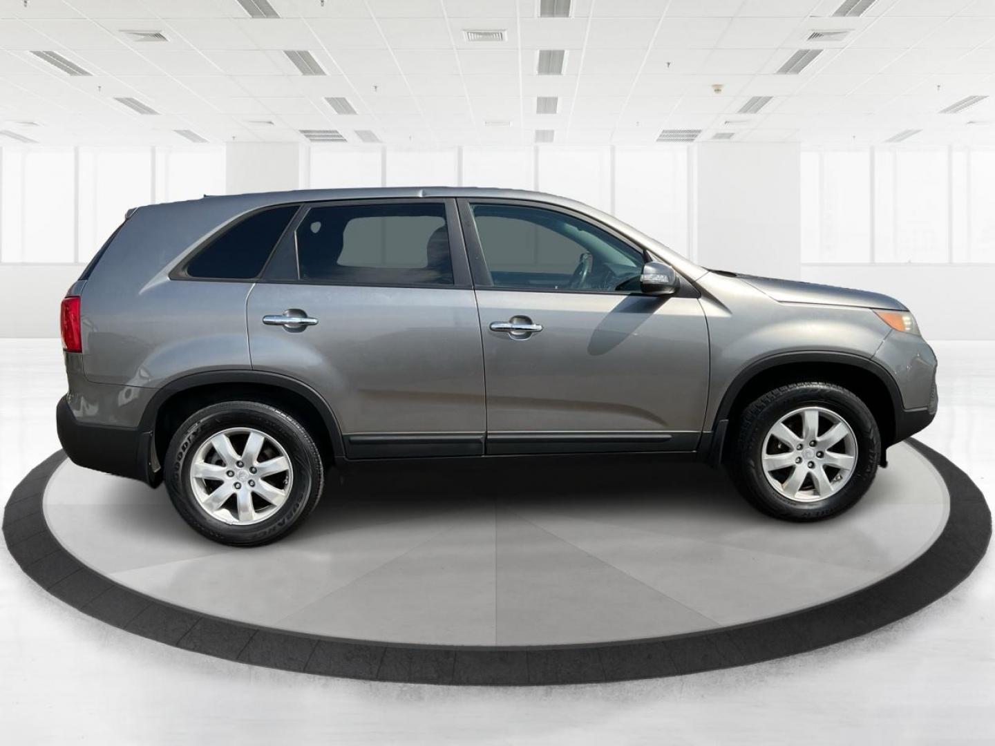 2012 Kia Sorento LX (5XYKT3A17CG) with an 2.4L I-4 DOHC engine, located at 401 Woodman Dr, Riverside, OH, 45431, (937) 908-9800, 39.760899, -84.123421 - Photo#1