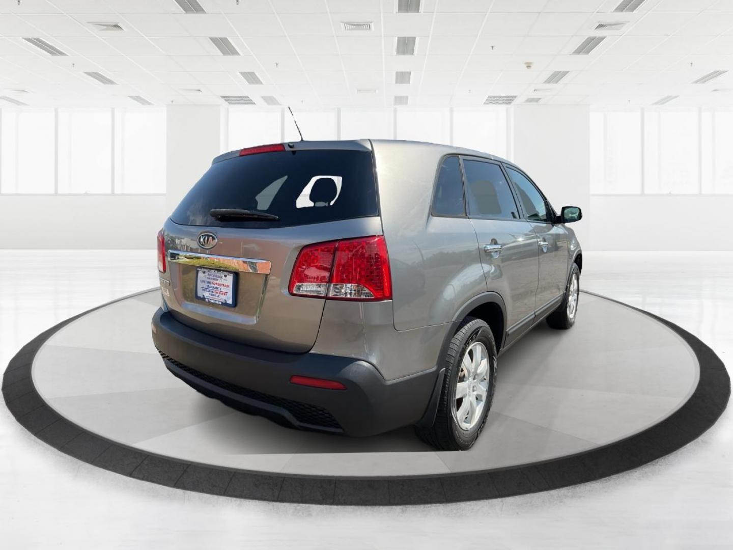 2012 Kia Sorento LX (5XYKT3A17CG) with an 2.4L I-4 DOHC engine, located at 401 Woodman Dr, Riverside, OH, 45431, (937) 908-9800, 39.760899, -84.123421 - Photo#2