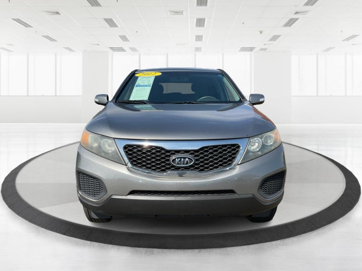 2012 Kia Sorento LX (5XYKT3A17CG) with an 2.4L I-4 DOHC engine, located at 401 Woodman Dr, Riverside, OH, 45431, (937) 908-9800, 39.760899, -84.123421 - Photo#6